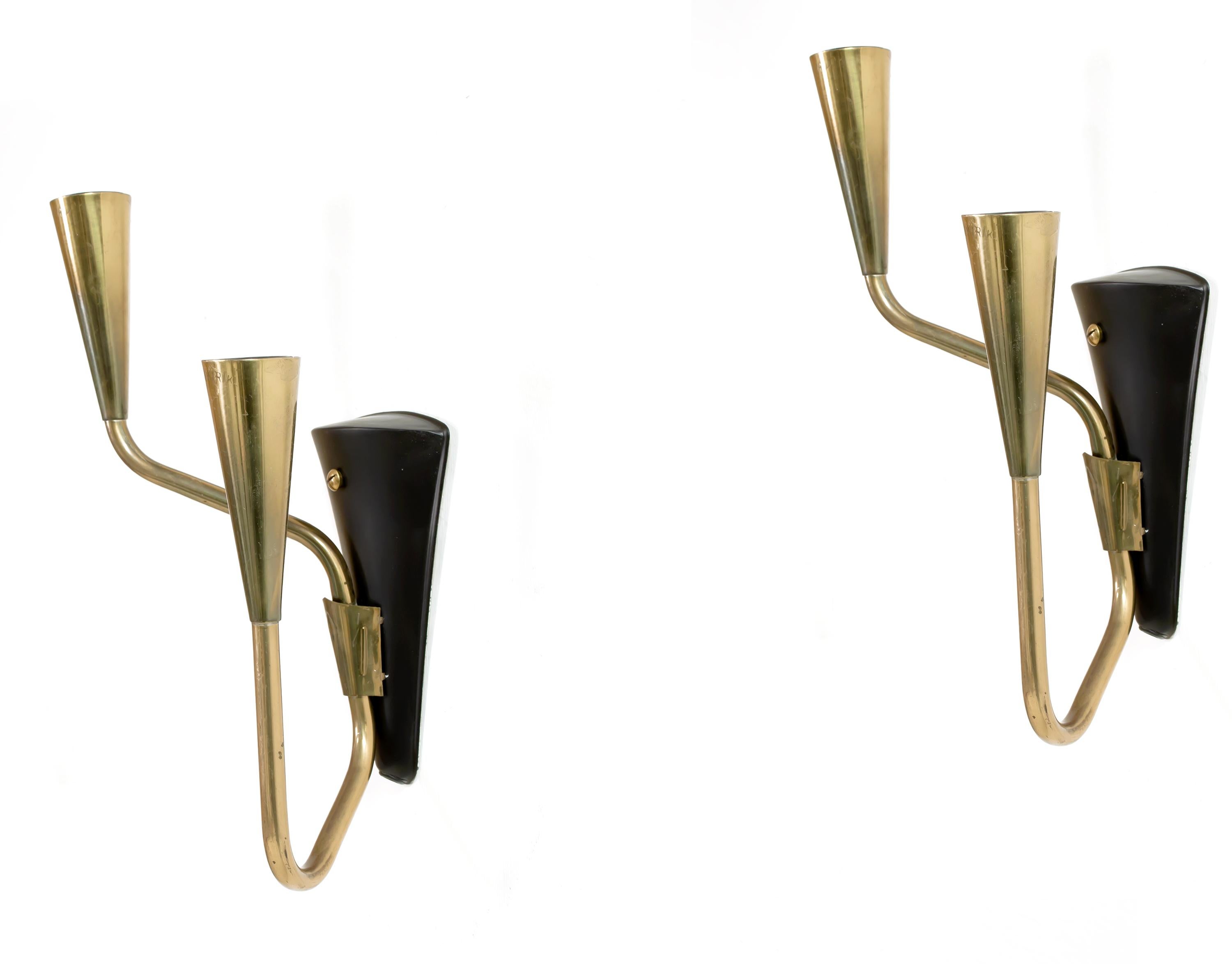 Sublime and Minimalist pair of wall lights in brass. Designed and made in Norway from circa 1960s first half by Elektrik AS. Both lamps are in very good vintage condition and fully working.