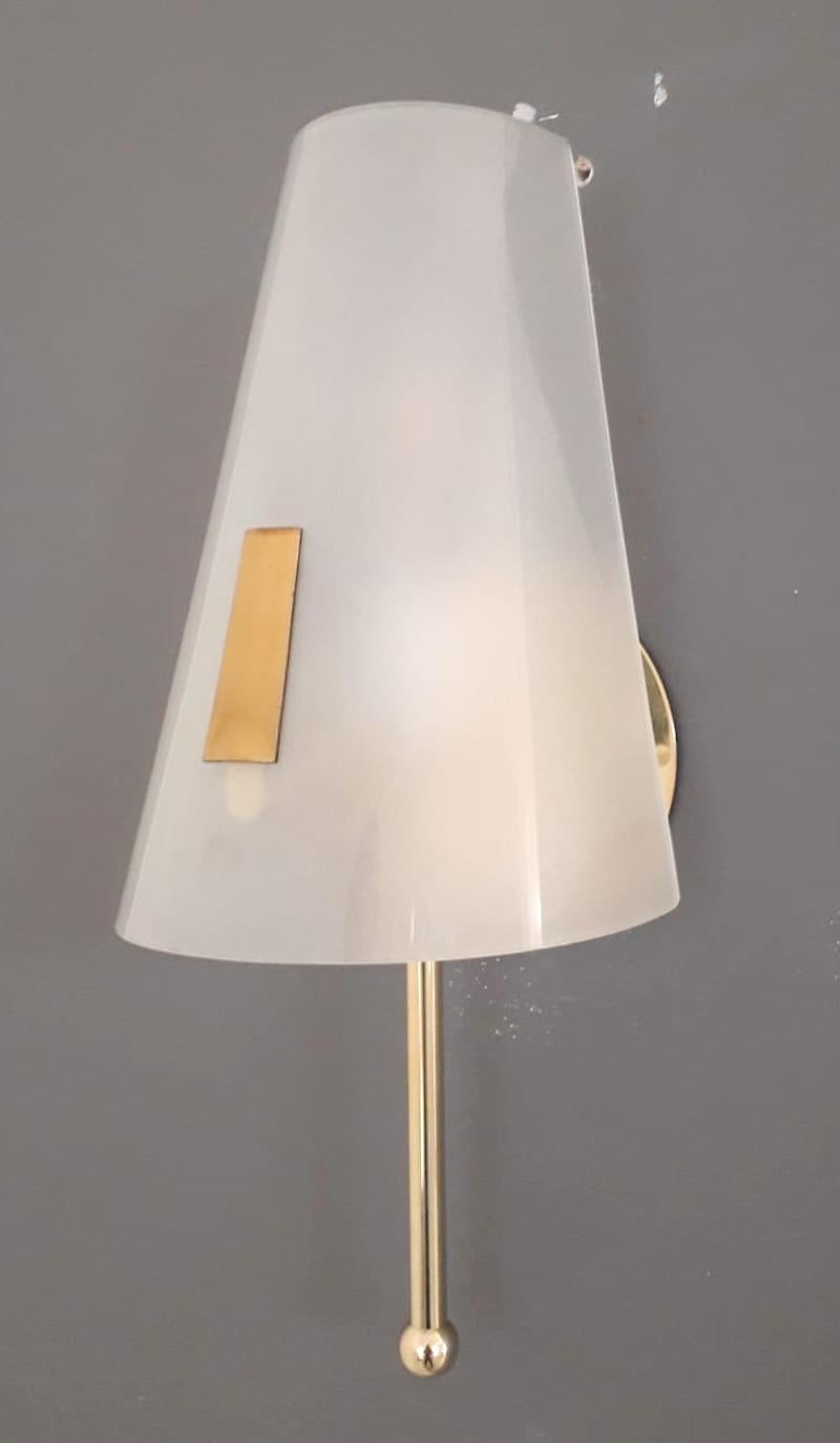 Vintage Italian wall lights with hand blown opaline Murano glass shades mounted on brass frames / Made in Italy circa 1960s
Measures: Height 11.5 inches, width 6 inches, depth 5 inches, backplate diameter 5 inches
1 light / E12 or E14 type / max