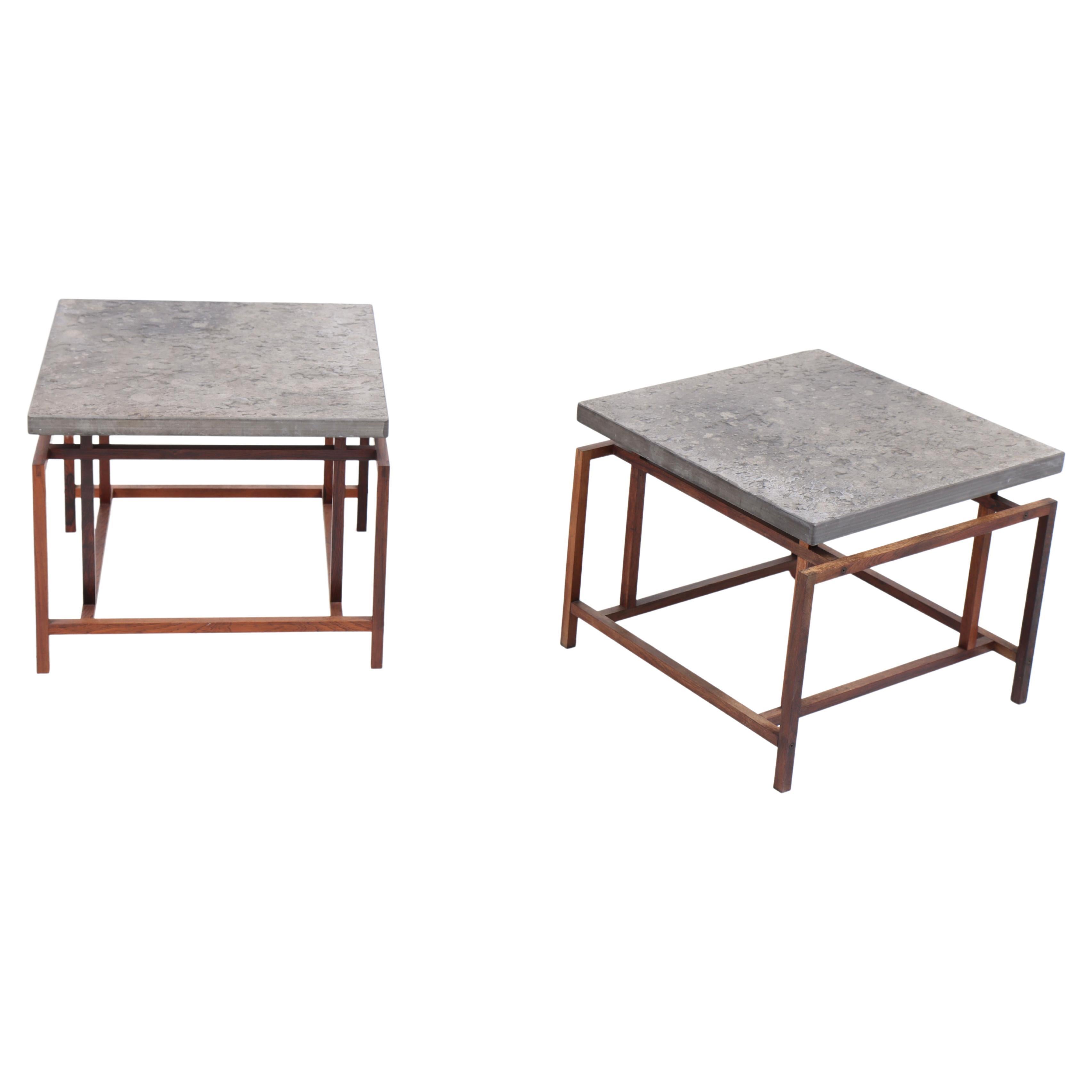 Pair of tables in rosewood and top of slate. Designed by Henning Nørregaard, in the 1960s. Great condition.