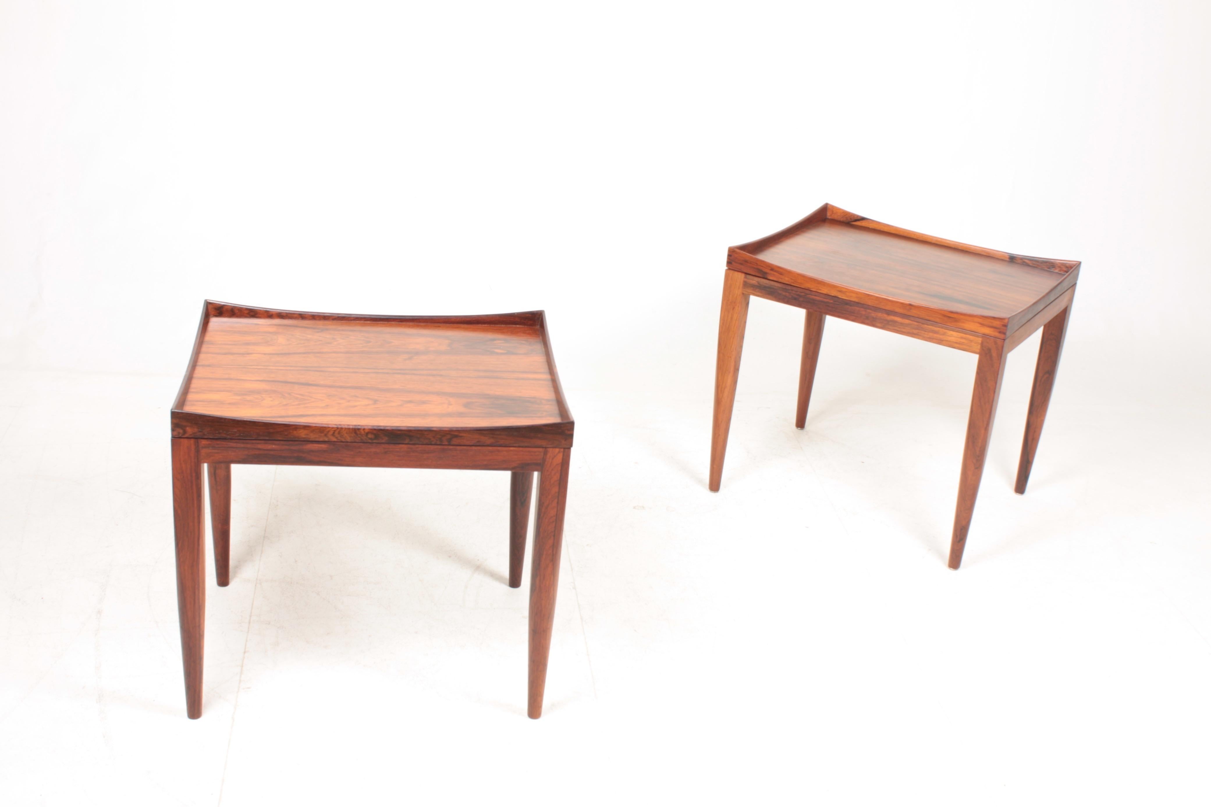 Pair of side tables in rosewood with trays, designed by Illum Wikkelsø. Great original condition.