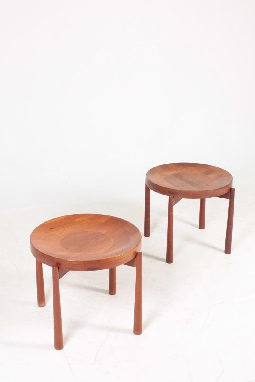 Pair of side tables in solid teak, made by DUX furniture in Sweden. Great original condition.