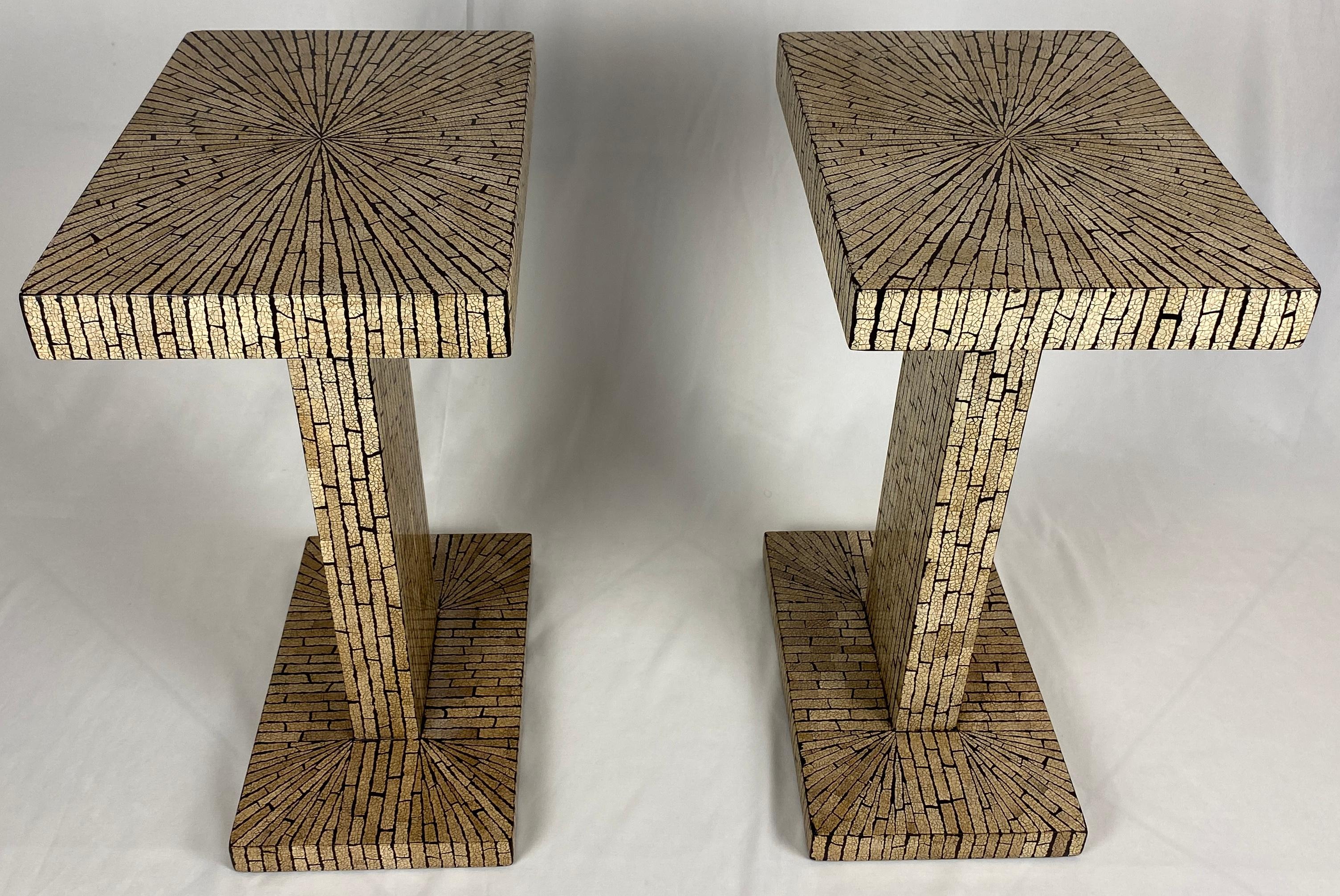 Stylish pair of elegant side tables, end tables or nightstands.
These side table or end tables would look great alongside a modern sofa or chair. 

Made of wood with marquetry inlay in the manner of Matteo Cubic designed furniture. The design is