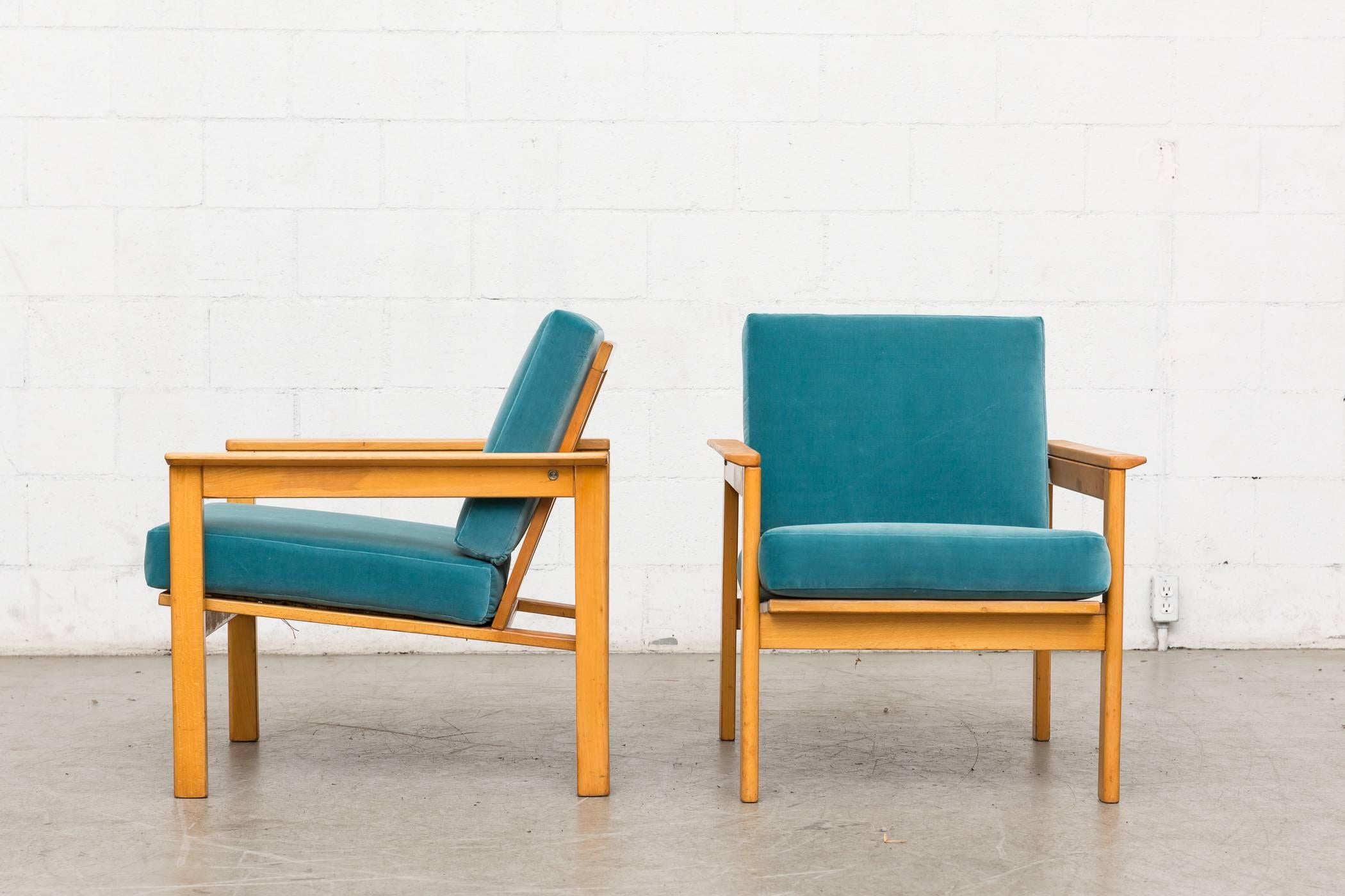 Handsome pair of pair of lightly refinished midcentury blonde slat back lounge chairs with new turquoise velvet upholstered cushions. Good original condition. Set price.