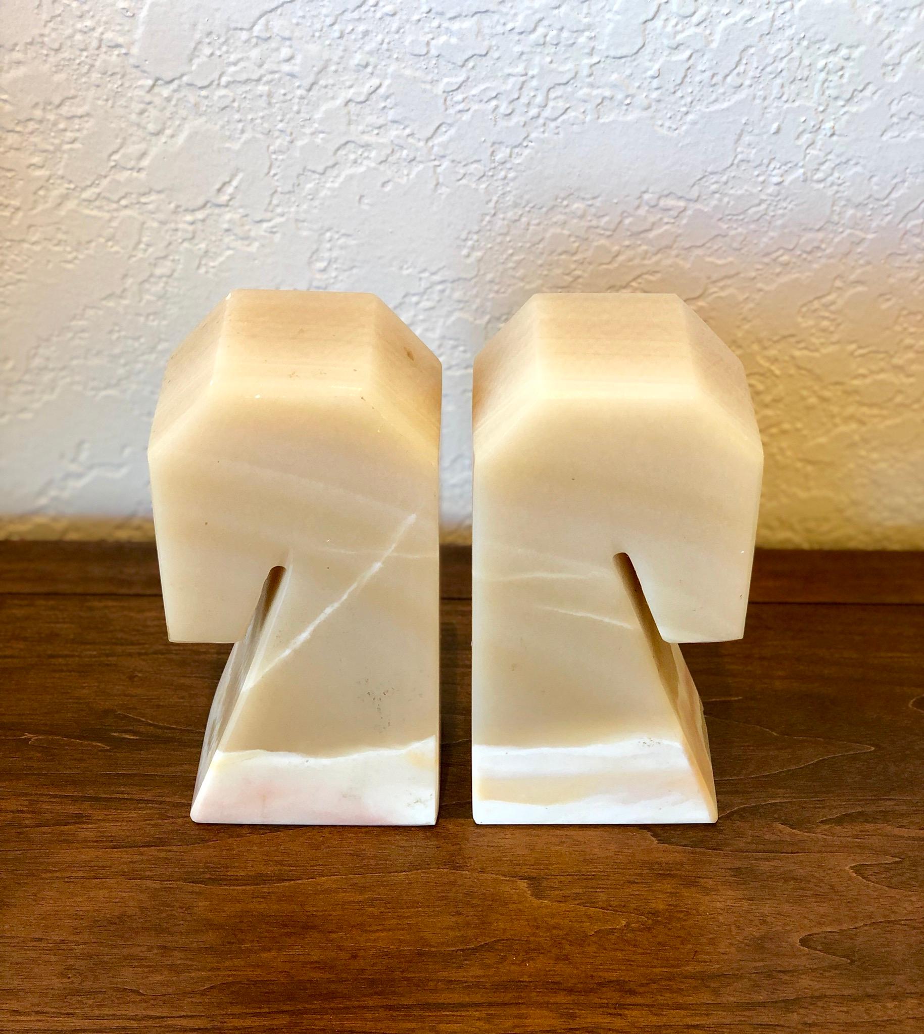 Substantial pair of solid onyx bookends, circa 1970s. Made in Mexico polished onyx, nice pieces.