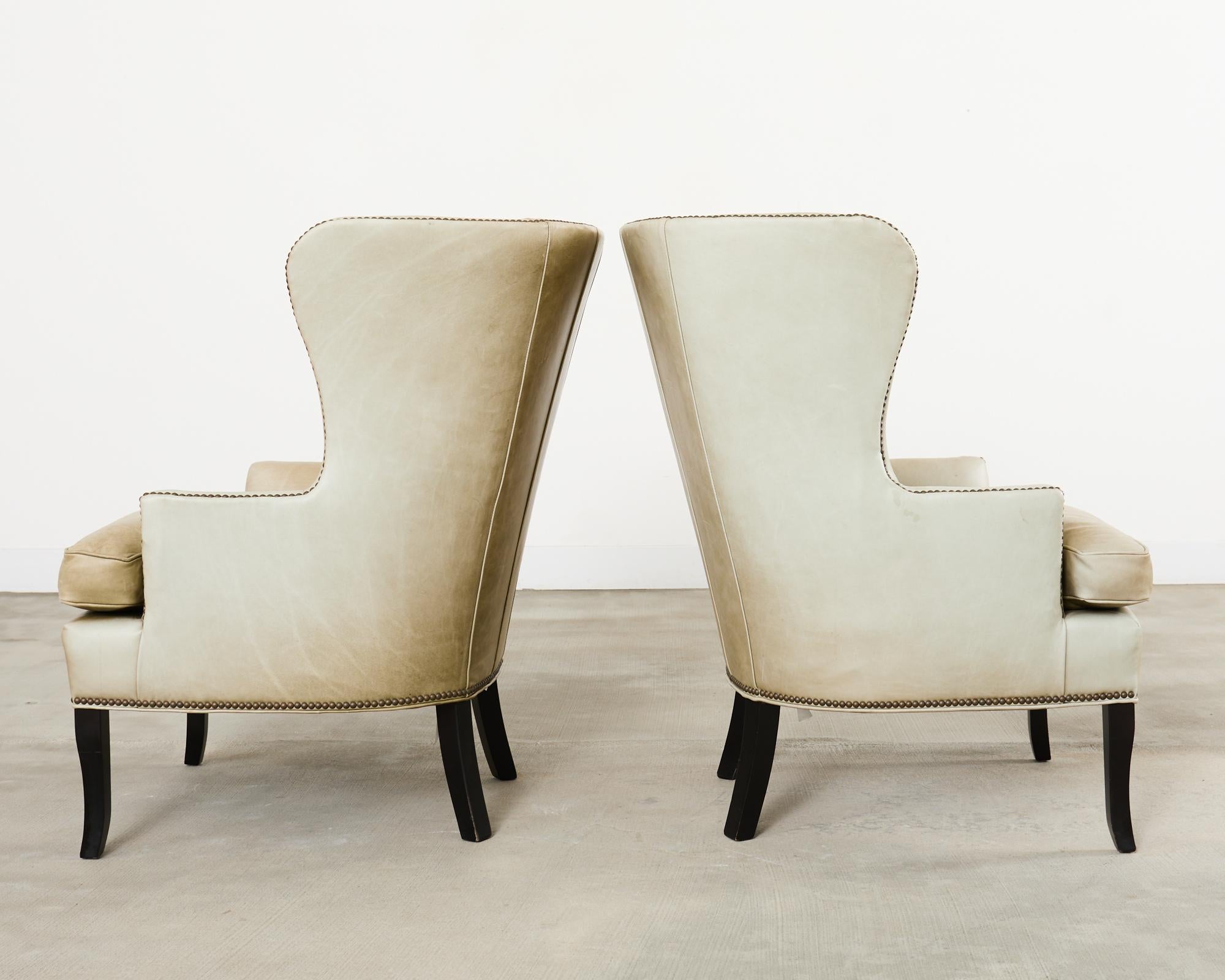 Pair of Midcentury Style Leather Butterfly Wingback Chairs In Distressed Condition For Sale In Rio Vista, CA
