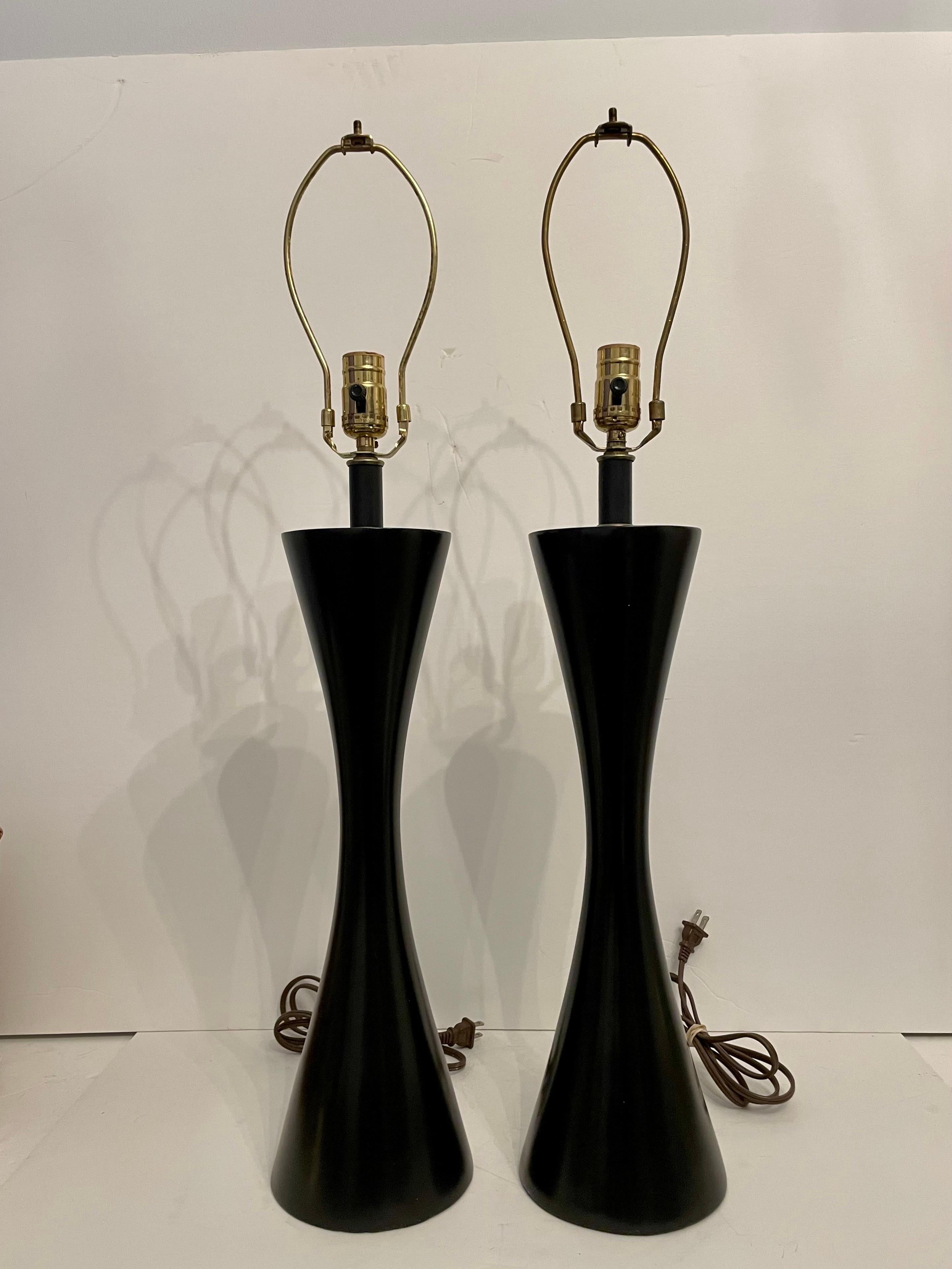 Tall pair of Palecek black lacquered table lamps with brass details.  24