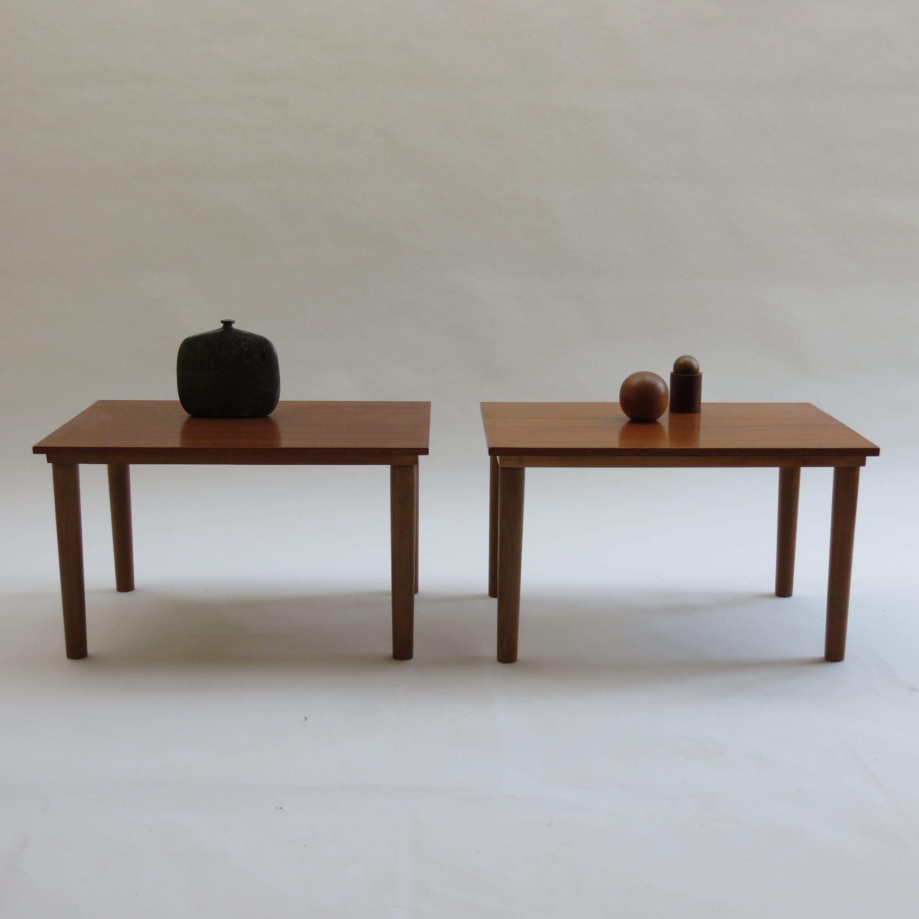 A pair of midcentury side tables in the style of Børge Mogensen. With teak veneered tops and solid beech legs. Produced in the 1960s. In good vintage condition.
3 identical sets of pairs of tables are available.

ST1203.