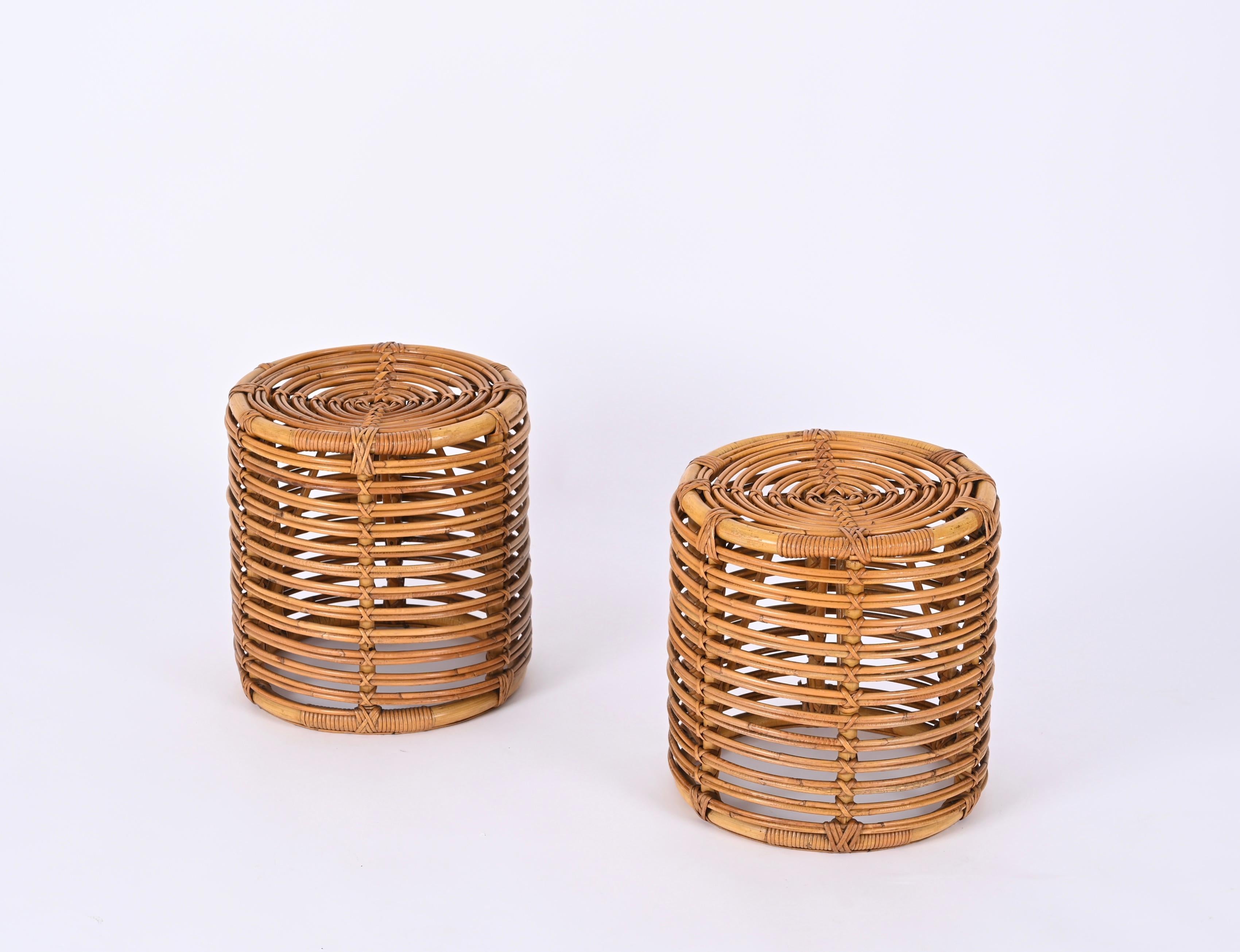 Beautiful pair of Tito Agnoli stools in rattan and bamboo. This fantastic and rare set was made in Italy during the 1960s.

The craftsmanship of these stools is exceptional and the curved bamboo structure allows each to be light and solid at the