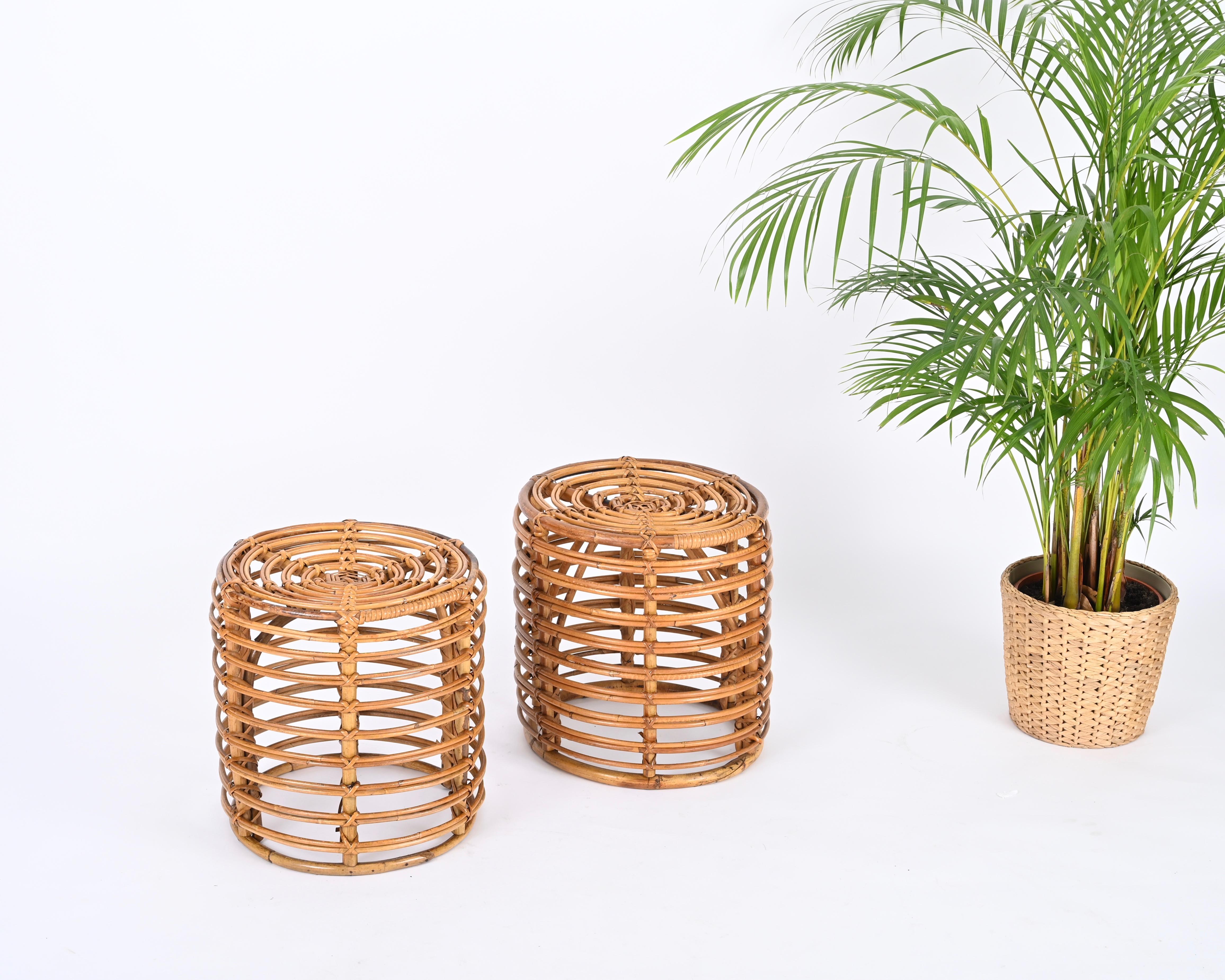 Gorgeous pair of  French Riviera poufs in curved bamboo and rattan. These fantastic and rare poufs were designed by Tito Agnoli and made in Italy during the 1960s.

The craftsmanship of these stools is exceptional and the curved bamboo structure