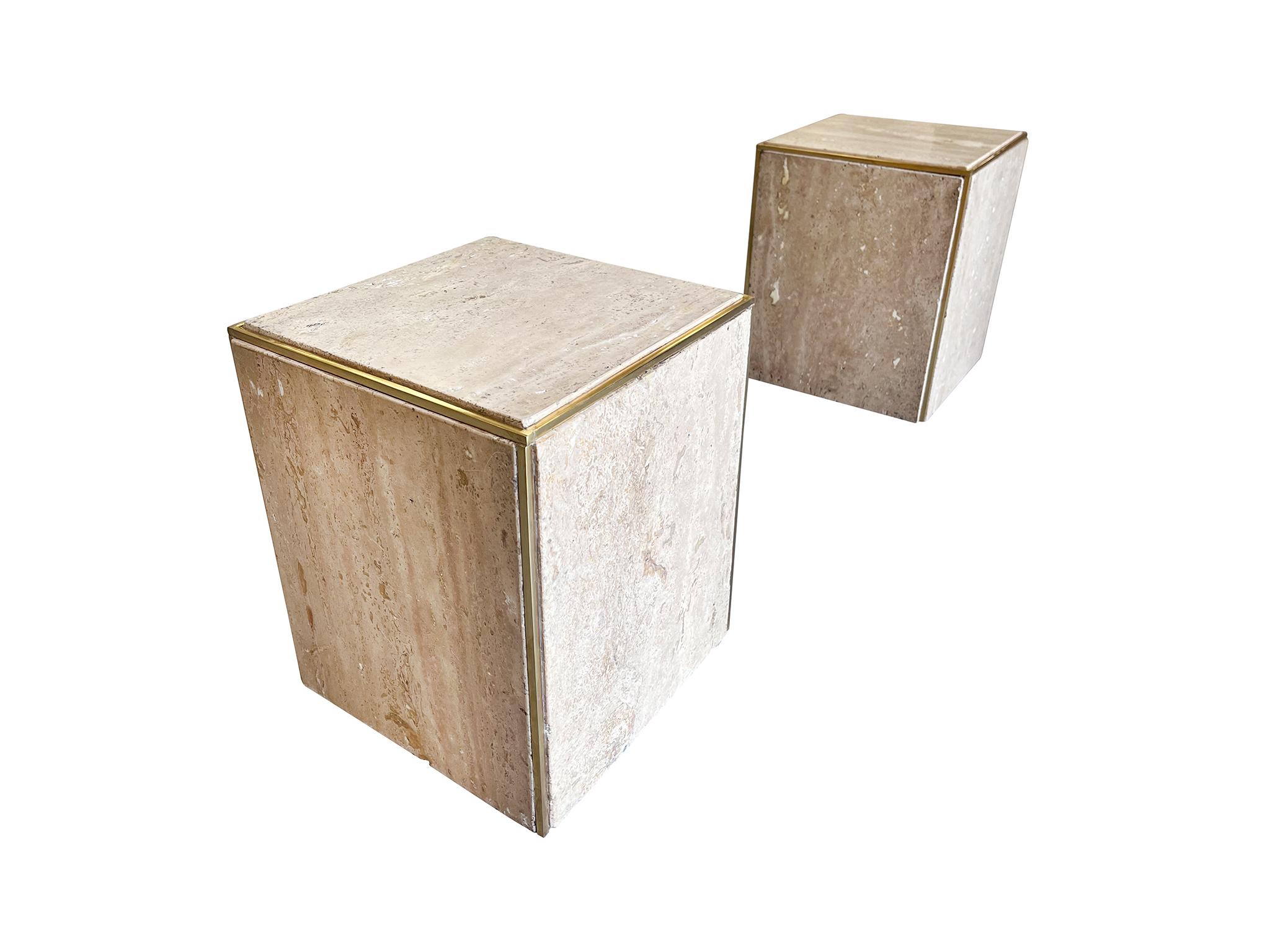 A pair of 1960s travertine cube side tables. The travertine has a subtle rose tint. Brass mounting follows the perimeter of the tables, creating a beautiful gold outline.

Dimensions:
13.5 in. width
13.5 in. depth
16 in. height

Condition