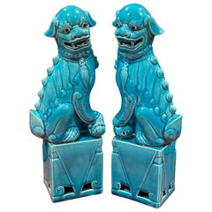a estatua de dagom Vintage Pair of Midcentury Turquoise Blue Ceramic Foo Dog Sculptures