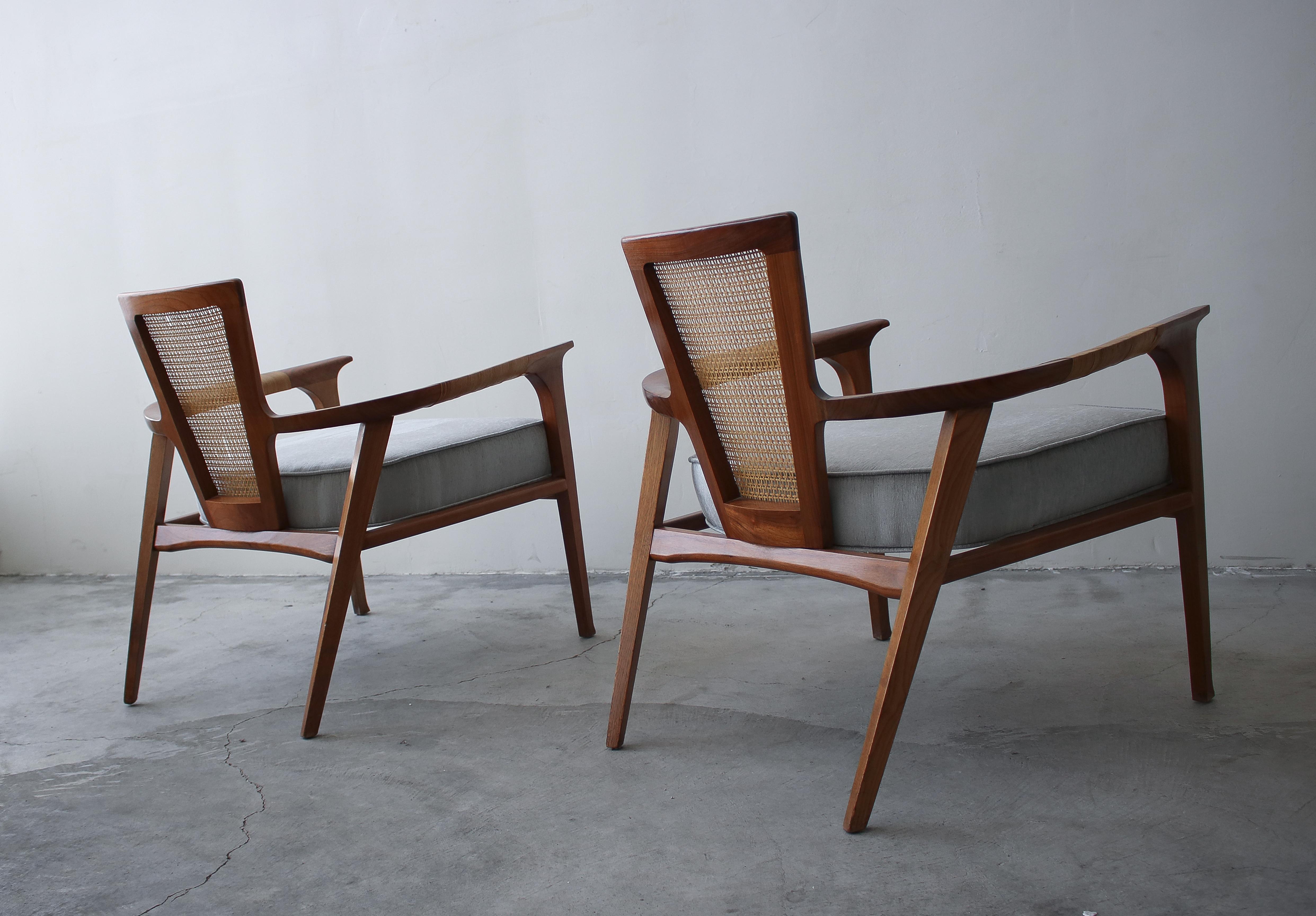 20th Century Pair of Midcentury Walnut and Cane Lounge Chairs by William Hinn
