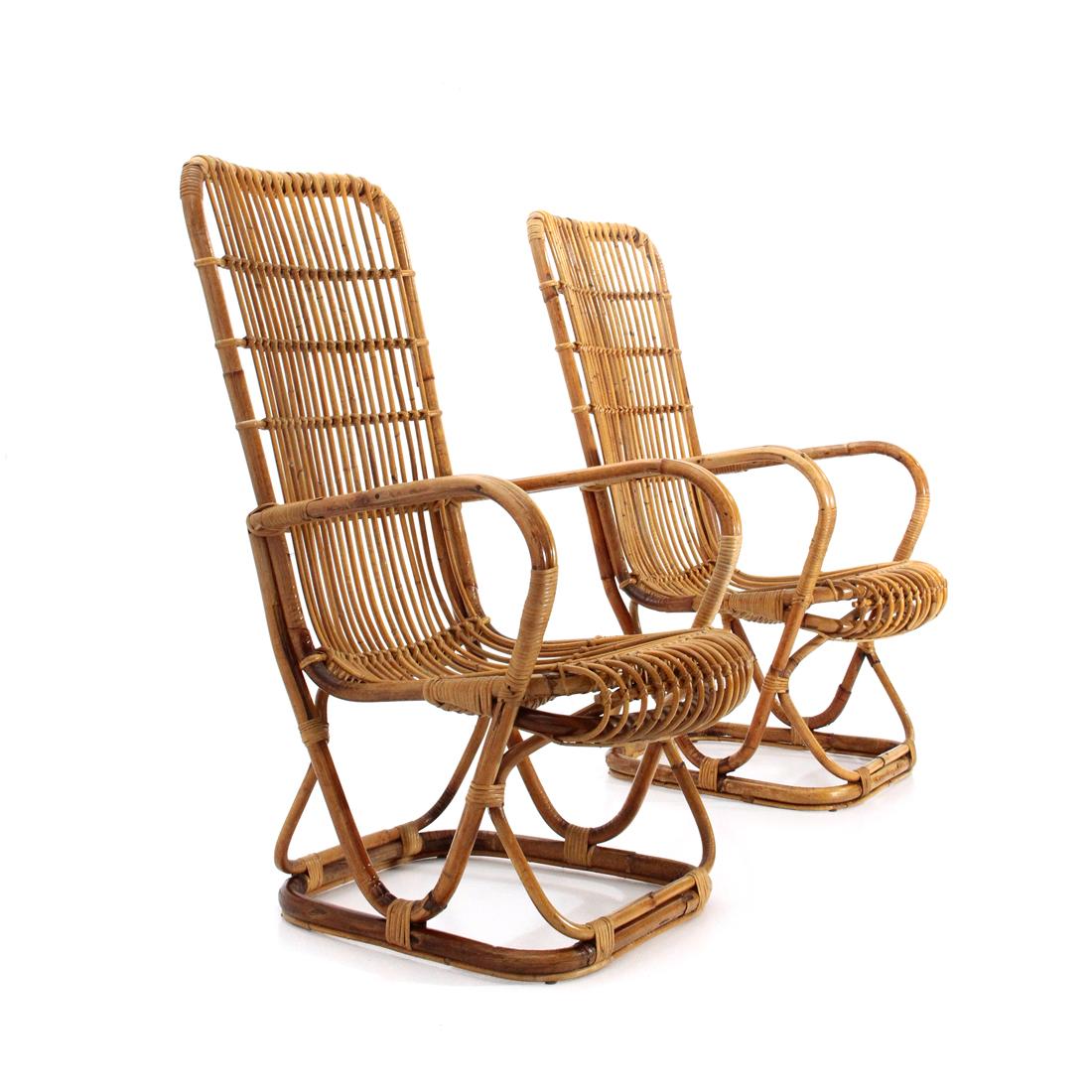 Pair of Italian-made rattan armchairs produced in the 1950s.
Curved bamboo structure.
Seat and knots in rattan.
Good general conditions, some signs due to normal use over time.

Dimensions: Length 61 cm, depth 70 cm, height 110 cm, seat height