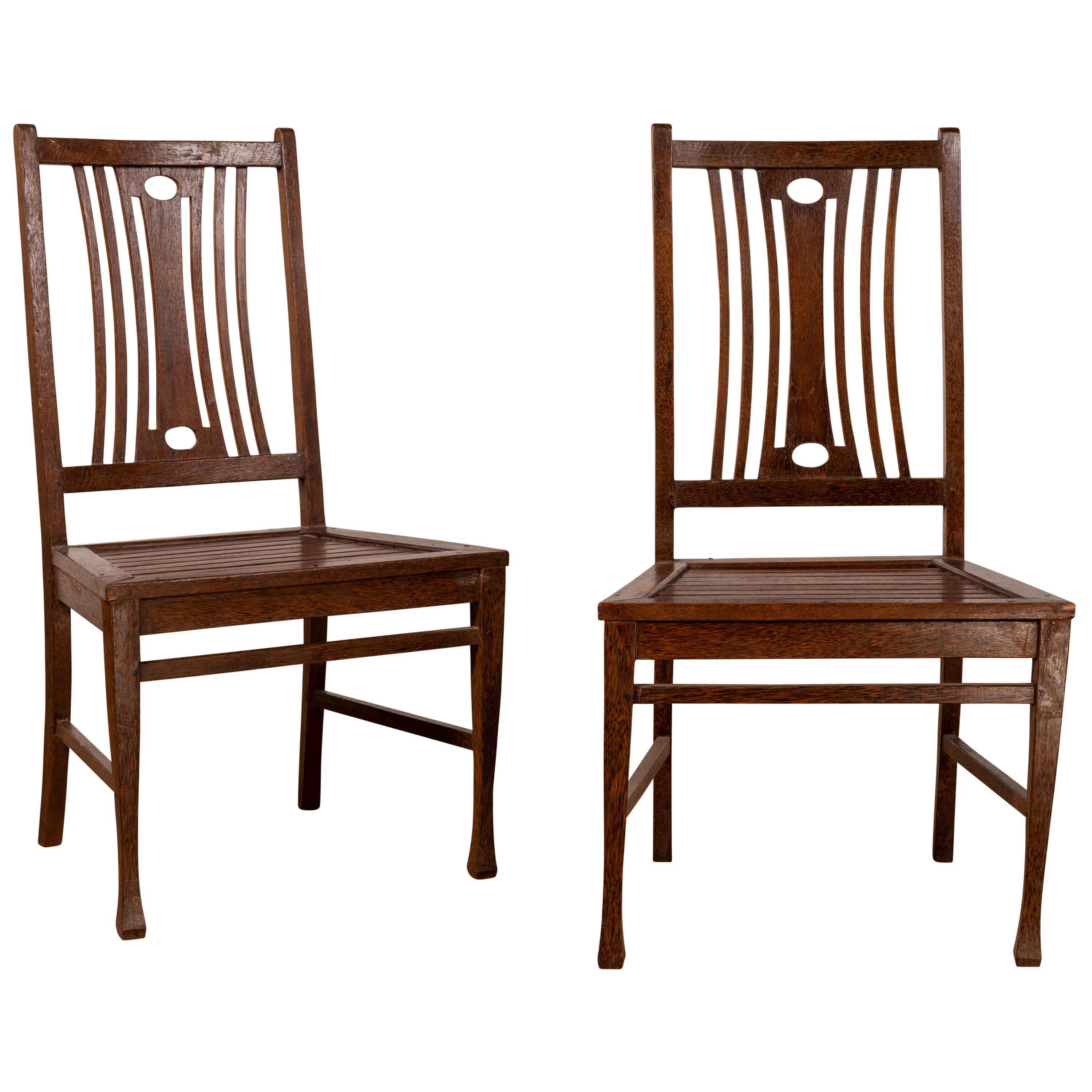 Pair of Midcentury Wooden Vintage Indonesian Side Chairs with Pierced Splats For Sale