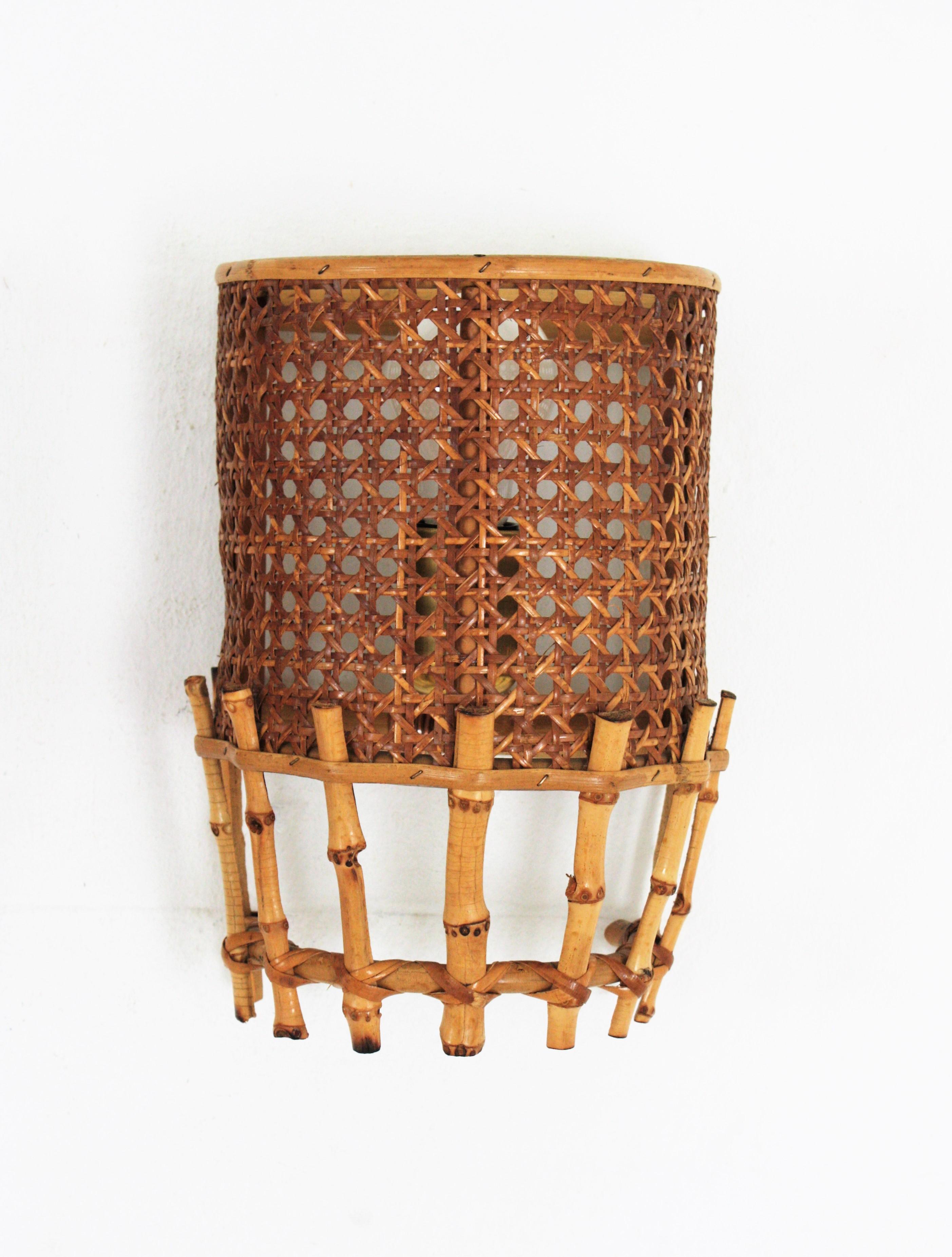 Rattan Pair of Midcentury Woven Wicker Weave and Bamboo Wall Sconces For Sale