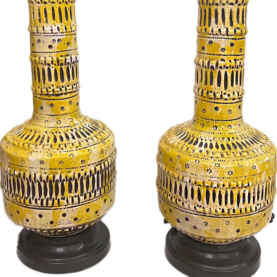 Pair of circa 1960's Italian polychromed table lamps.

Measurements:
Height of body: 23.25