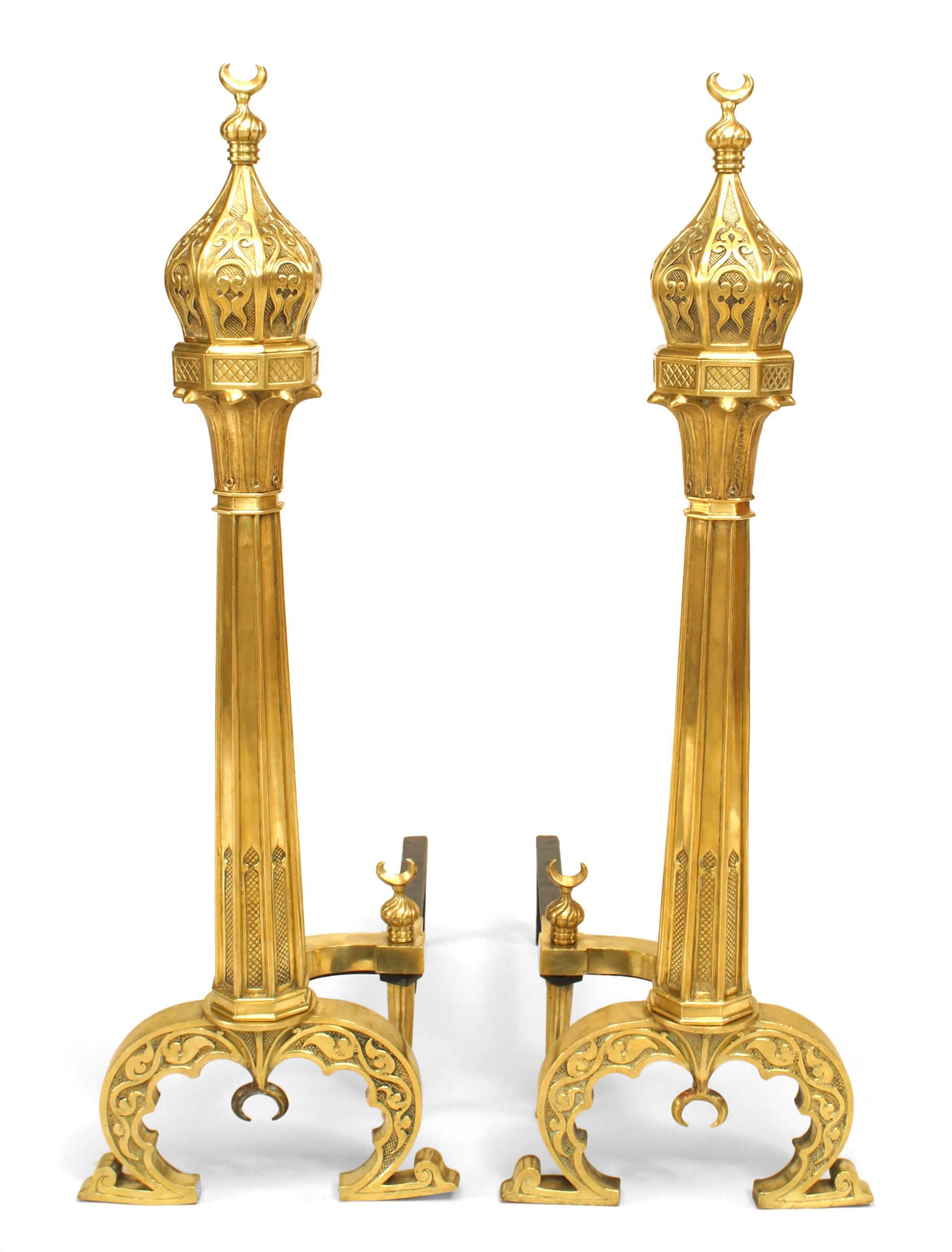 Pair of Middle Eastern Moorish design brass andirons with octagonal column and ball form with a crescent finial on top and bottom.
 