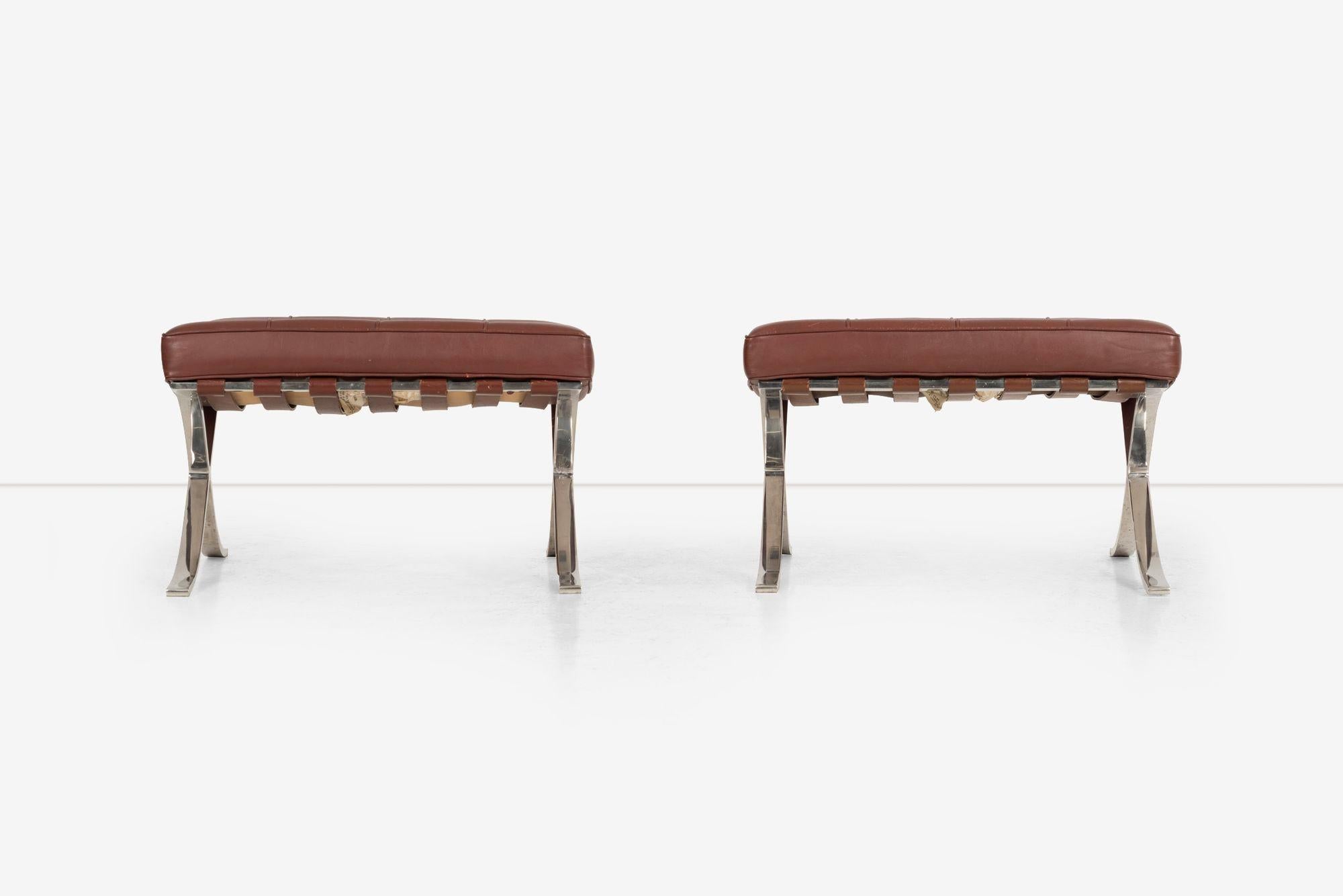 Pair of Mies van Der Rohe Barcelona Ottomans for Knoll International, Original Oxblood Leather, and straps with a stainless steel frame.
Featuring precise tufting, individual panels of leather are meticulously cut, hand-welted, and
