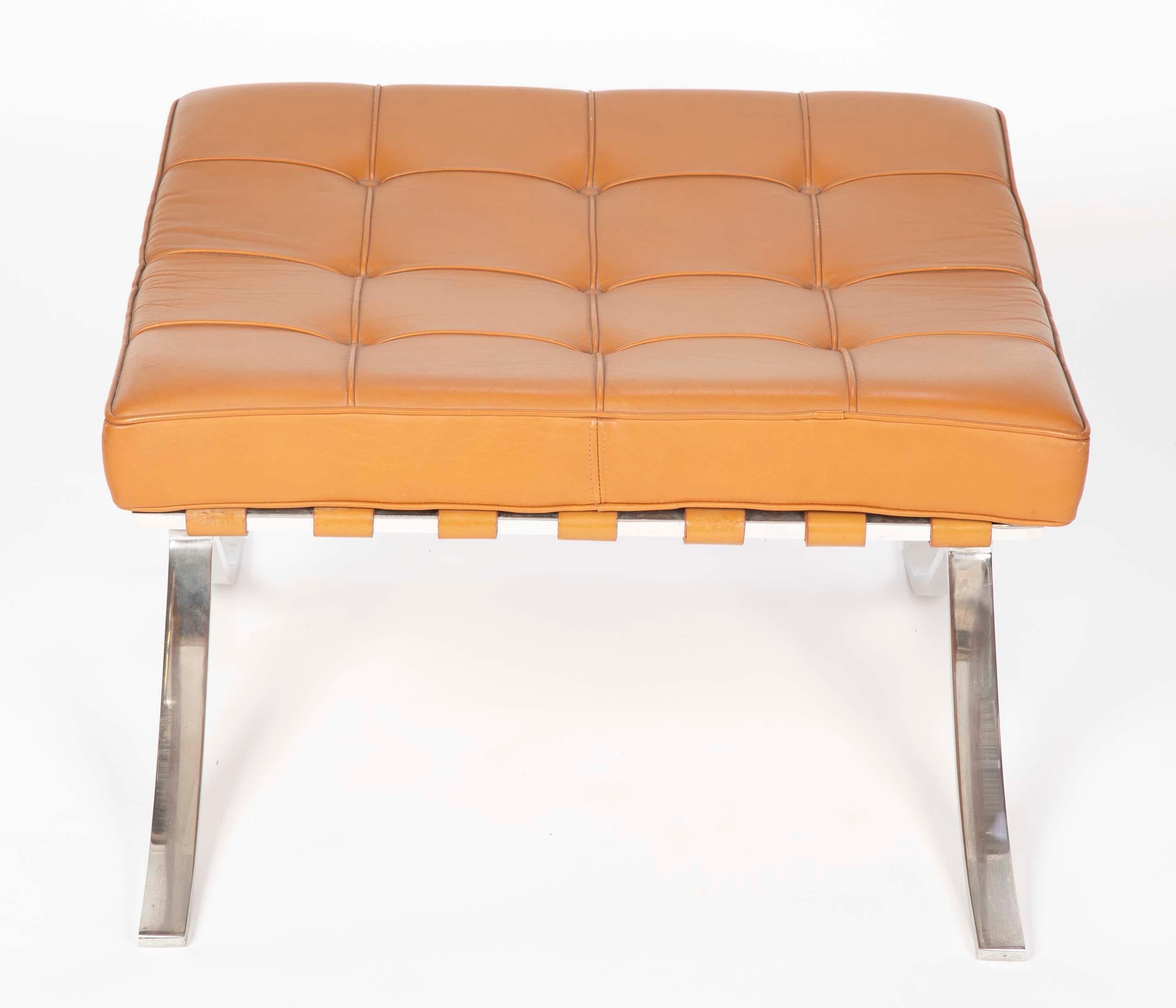 Pair of Mies van der Rohe for Knoll Barcelona ottomans with cognac leather upholstery, circa 1970s.