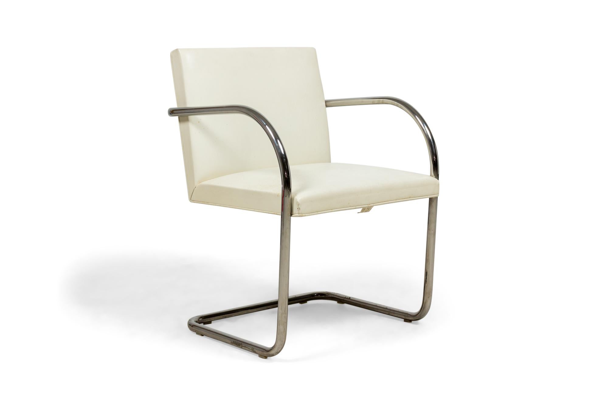 Pair of American Mid-Century 'Brno' armchairs with chrome tube frames and white leather upholstery. (Mies Van Der Rohe for Knoll International)(Priced as Pair).