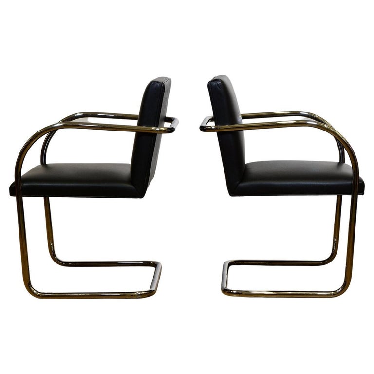 Pair of Knoll Brno chairs in black leather and steel chrome plated tubular frames. Circa 1980s. Paper label.

Originally designed in 1930 by Ludwig Mies van der Rohe for the Tugendhat House in Brno, Czechoslovakia.

Upholstered in a soft black