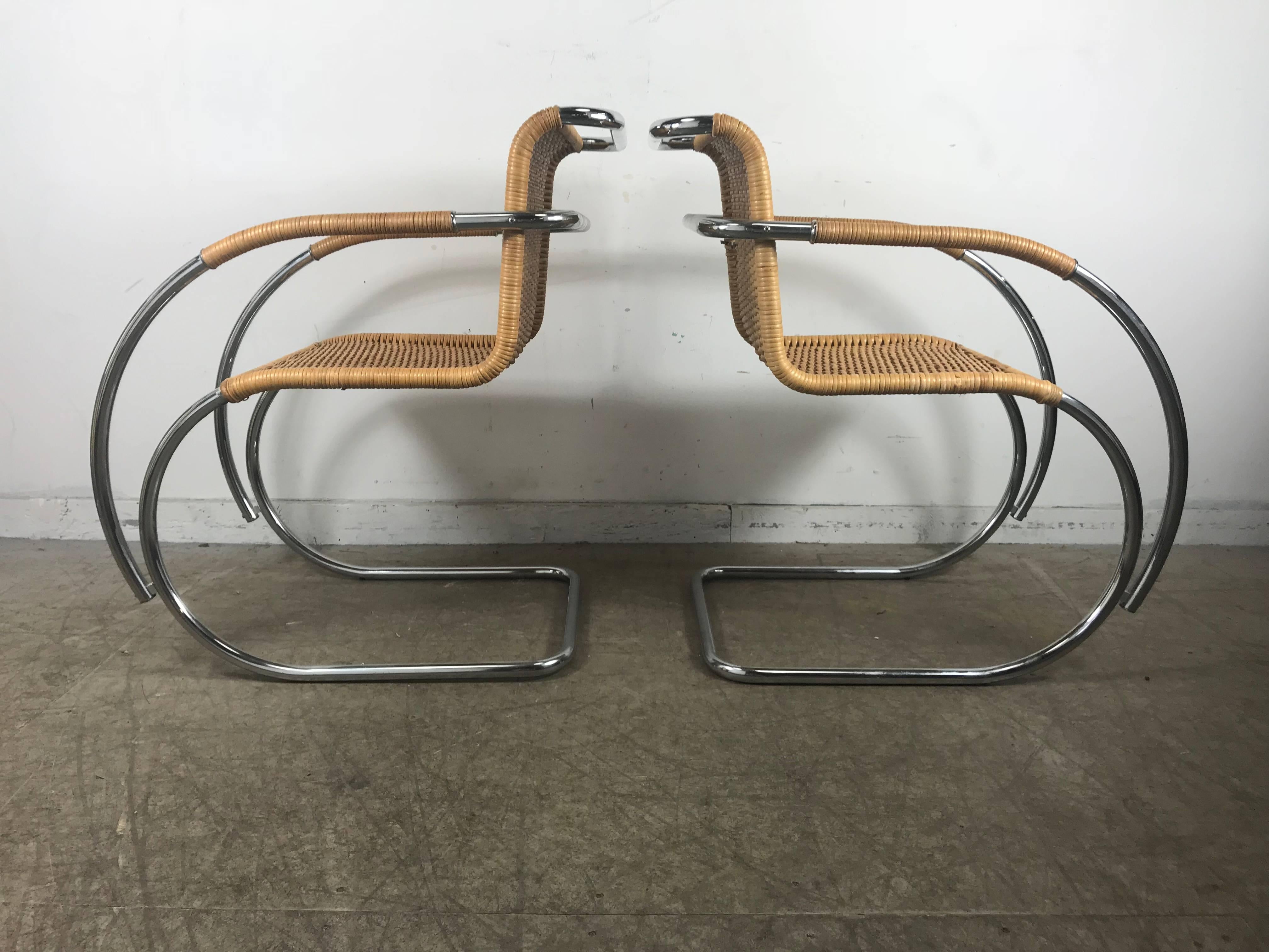 Pair of Mies van der Rohe wicker and chrome armchairs. Classic Bauhaus style, 
