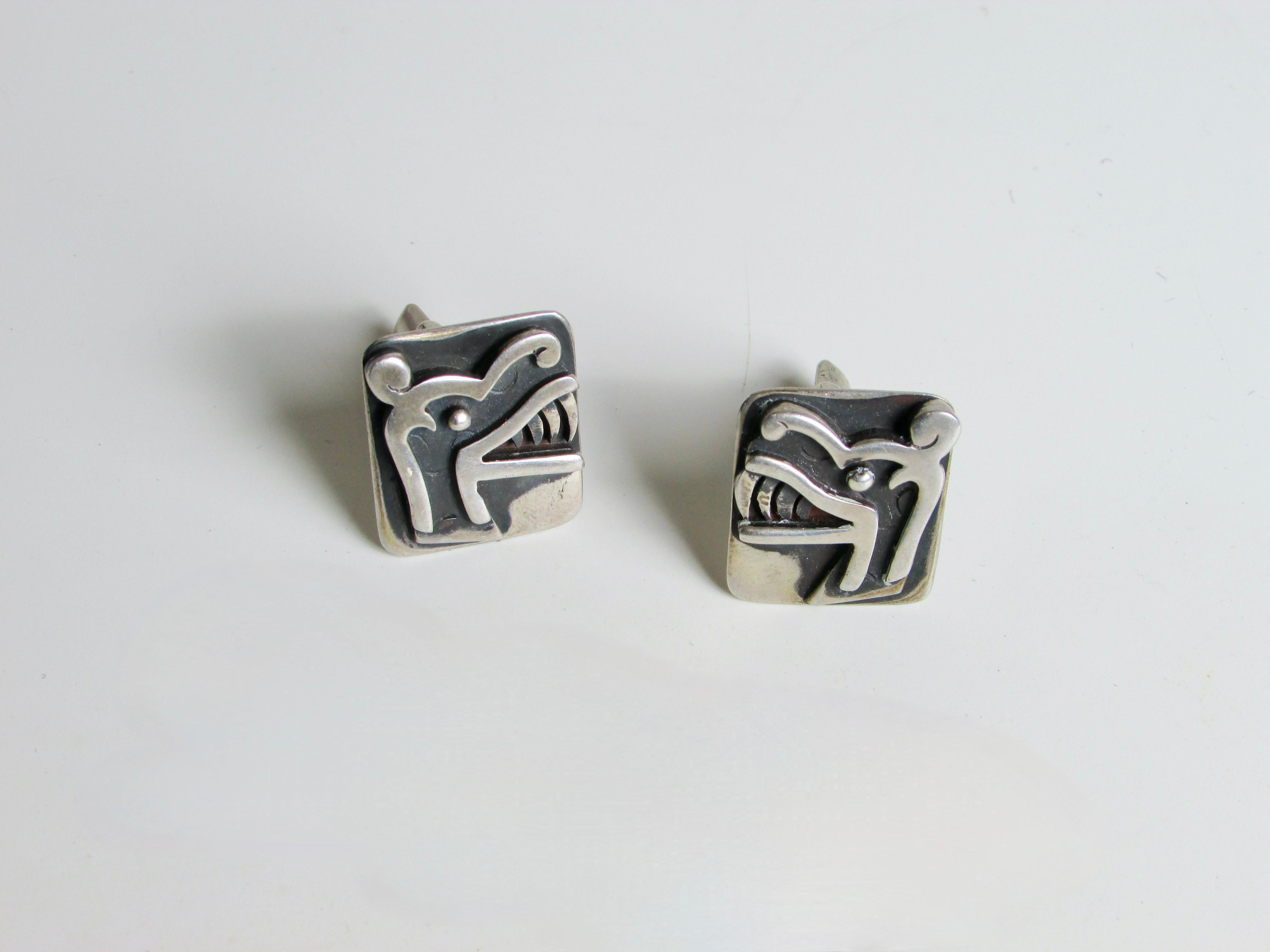 Pair of Miguel Garcia designed modernist cuff links from Taxco Mexico . One Marked 
