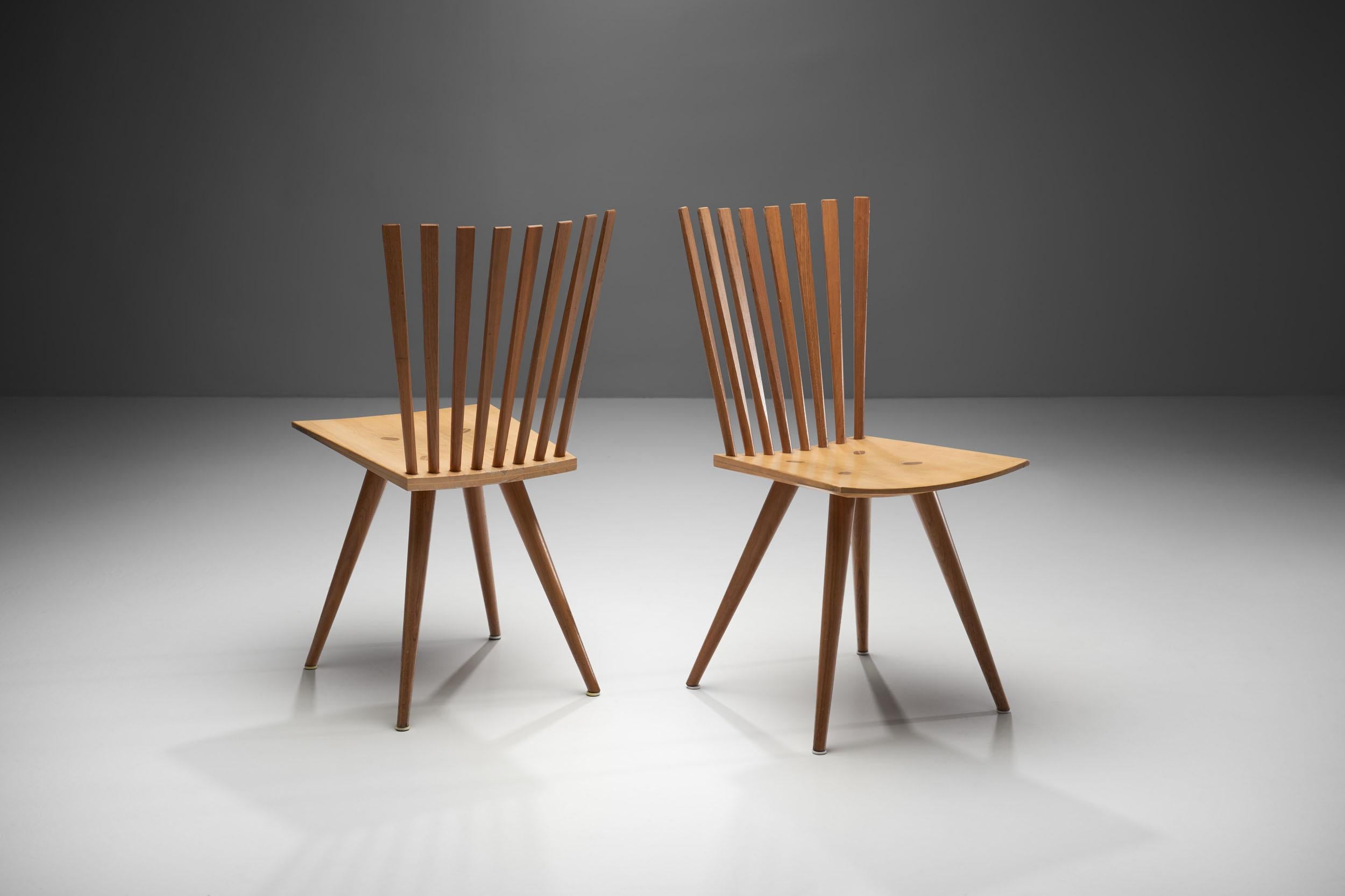 This pair of model J152 chairs by the Danish designer duo, Johannes Foersom and Peter Hiort-Lorenzen, is better known as the “Mikado” chair.

The Mikado is a modern interpretation of the 18th century English Windsor chair, whereby the chairs are