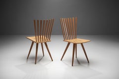 Paire de chaises Mikado de Johannes Foersom et Peter Hiort-Lorenzen en bois de noyer