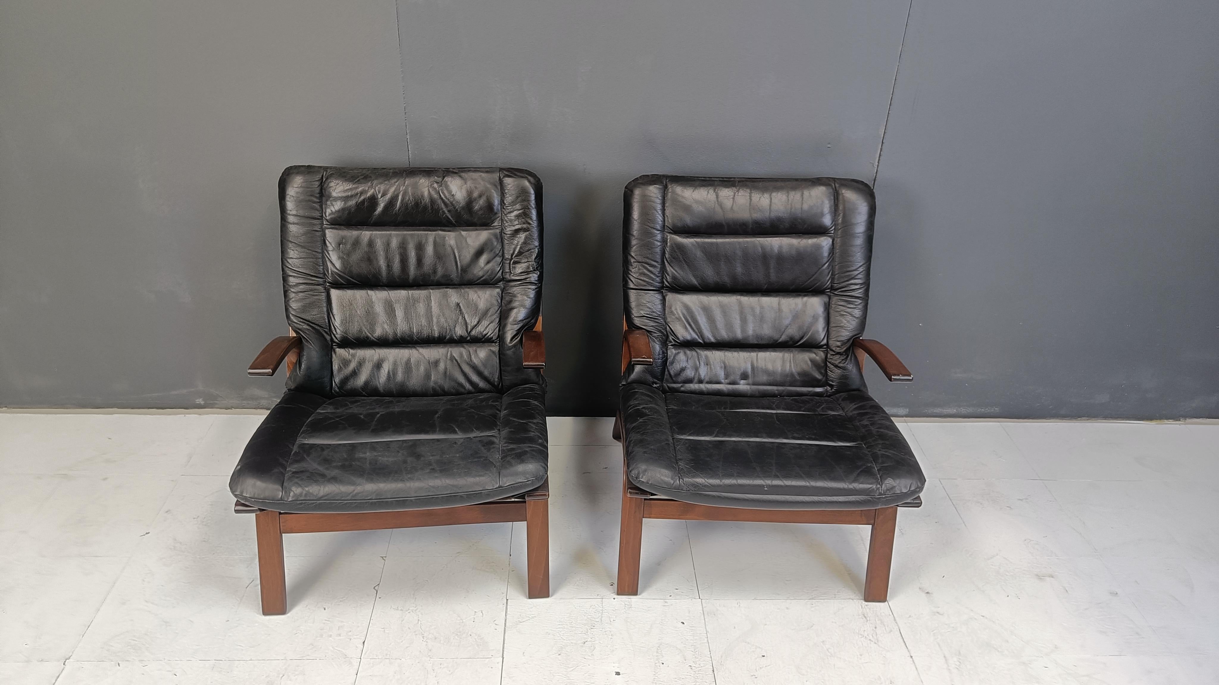 Mid century leather armchairs model 'Miljo' by Farstrup Mobler made out of black leather and beautiful bentwood frames.

Scandinavian design, from Denmark.

Dimensions:
Height: 85cm
Width: 65cm
Depth: 75cm
Seat height: 42cm

Ref.: 25031905