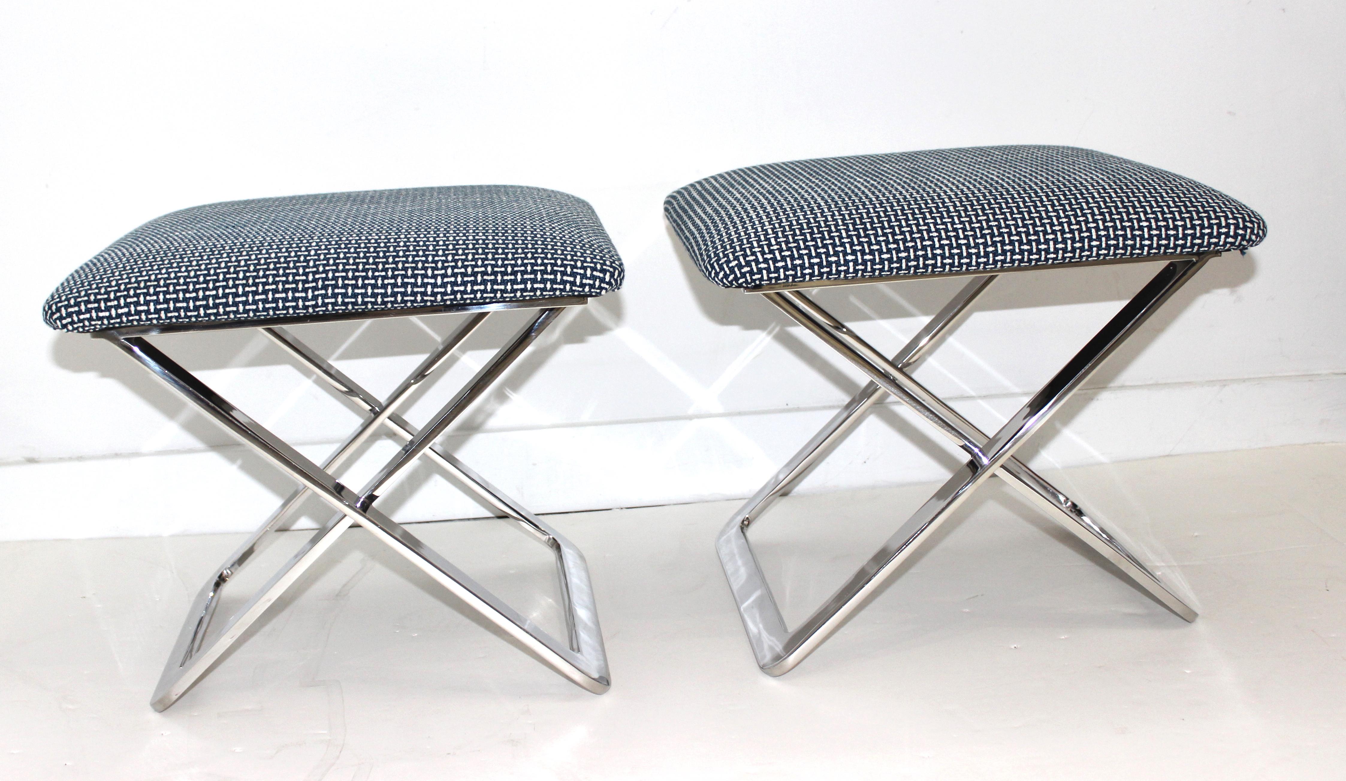 Super-chic pair of Mid-Century Modern X-Stools in polished stainless steel attributed to Milo Baughman. Newly re-upholstered.