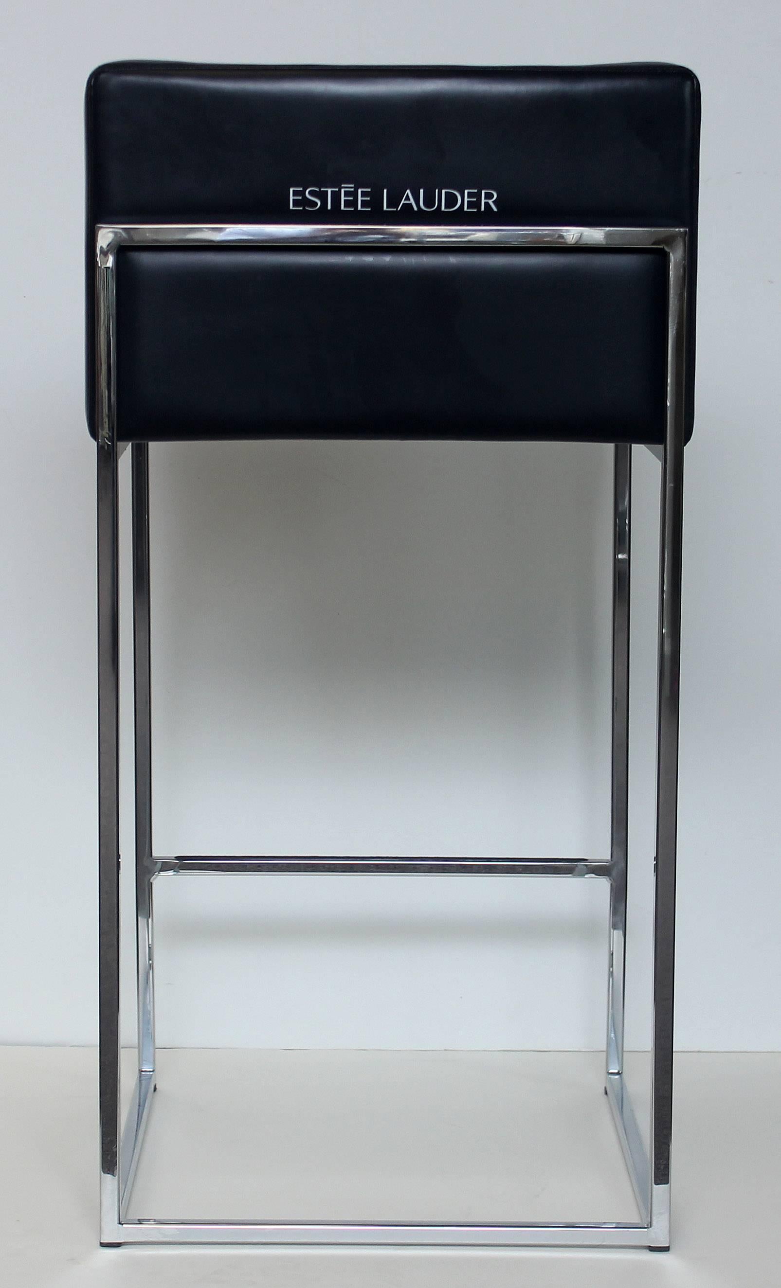 Pair of Milo Baughman stools for Estée Lauder department store makeup counters. Chrome and vinyl.