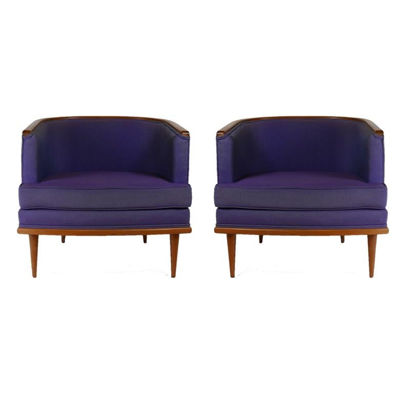 A great pair of Milo Baughman chairs in original fabric that could be used as is but certainly would benefit from new upholstery. The walnut legs and trim are in excellent condition.