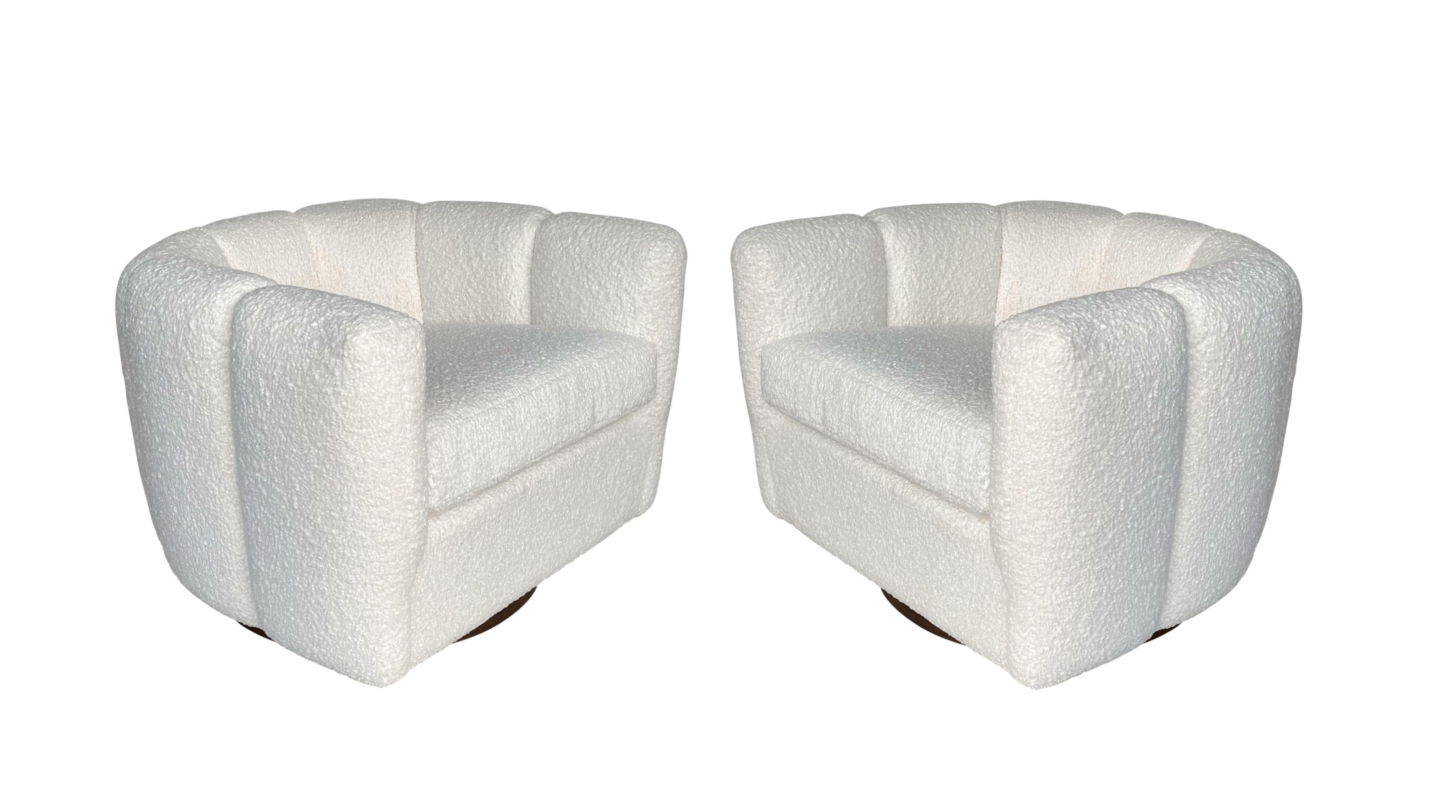 American Pair of Channel Back Swivel Chairs in White Bouclé in the Style of Milo Baughman