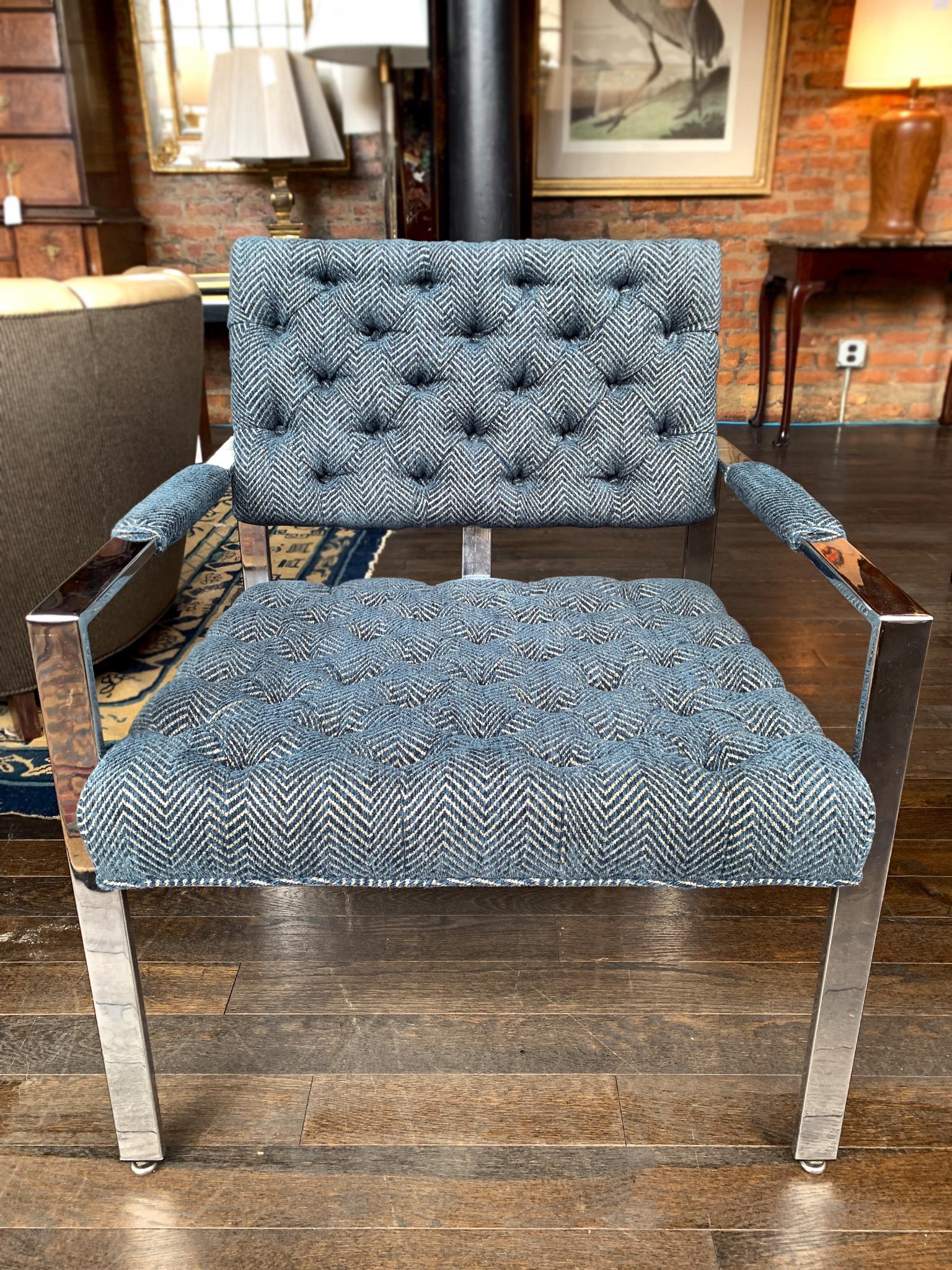 Pair of Milo Baughman lounge chairs made in the 1970s, with chrome frame. They are newly reupholstered with a high-performance, blue-and-white chevron fabric from Kravet. Other remarkable design details include the button tufting in the backrest and