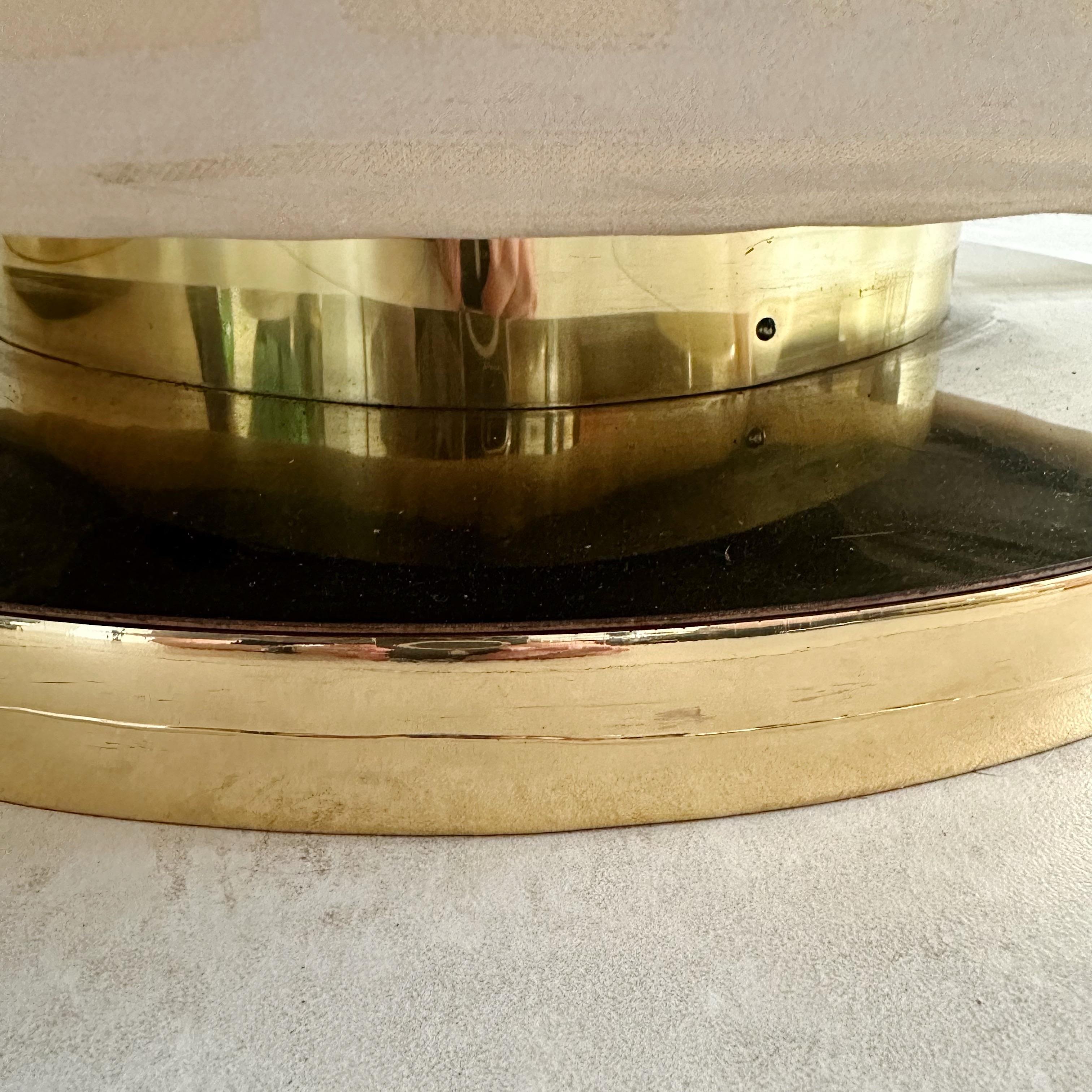 Pair of Milo Baughman Clamshell Swivel Chairs With Brass Basses 1