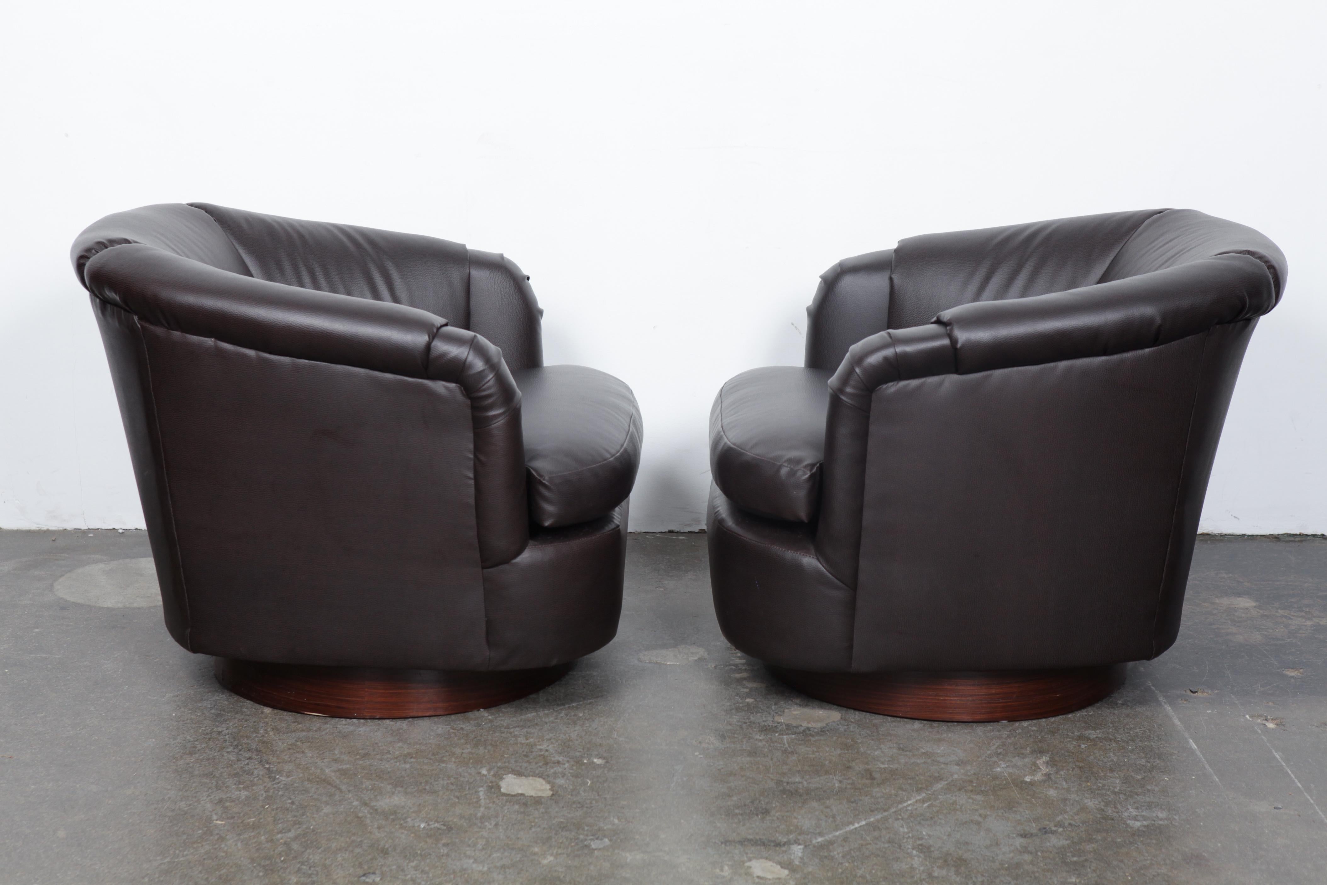 dark brown leather swivel chair