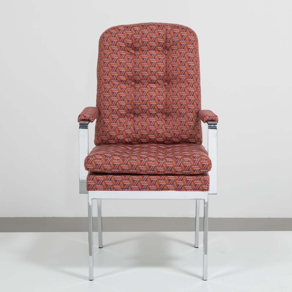 Pair of Arthur Umanoff for Dillingham designed chromium steel framed, high backed upholstered chairs with upholstered arm pads. 1970s

Arthur Umanoff, (American, 1923-1985) is best known for his furniture being of a simple design. This was very