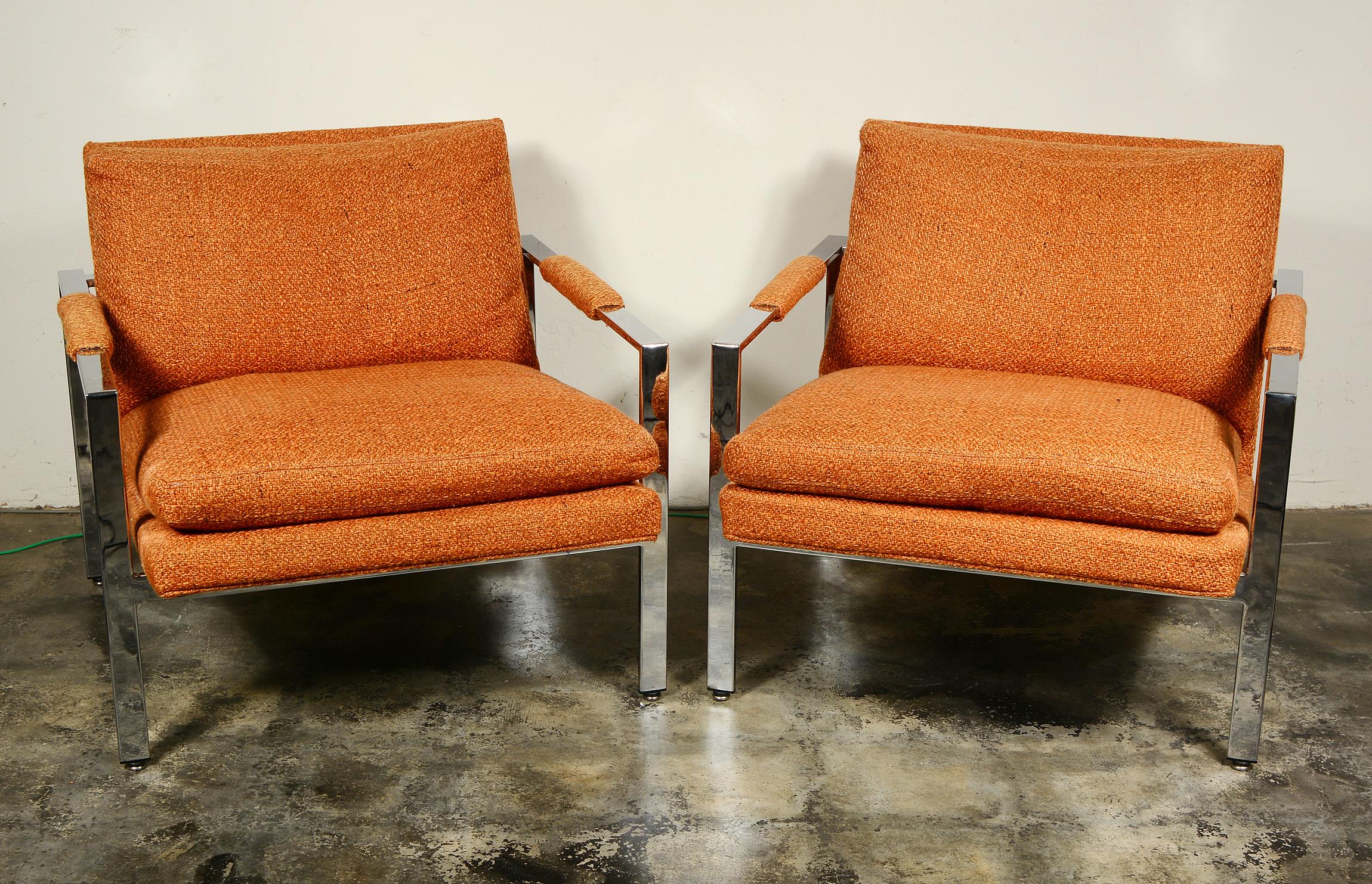 Pair of flat chrome bar lounge chairs designed by Milo Baughman for Thayer Coggin. These low profile chairs sit very comfortably. These retain the original upholstery. It has faded in areas but is usable as is. We would recommend new upholstery