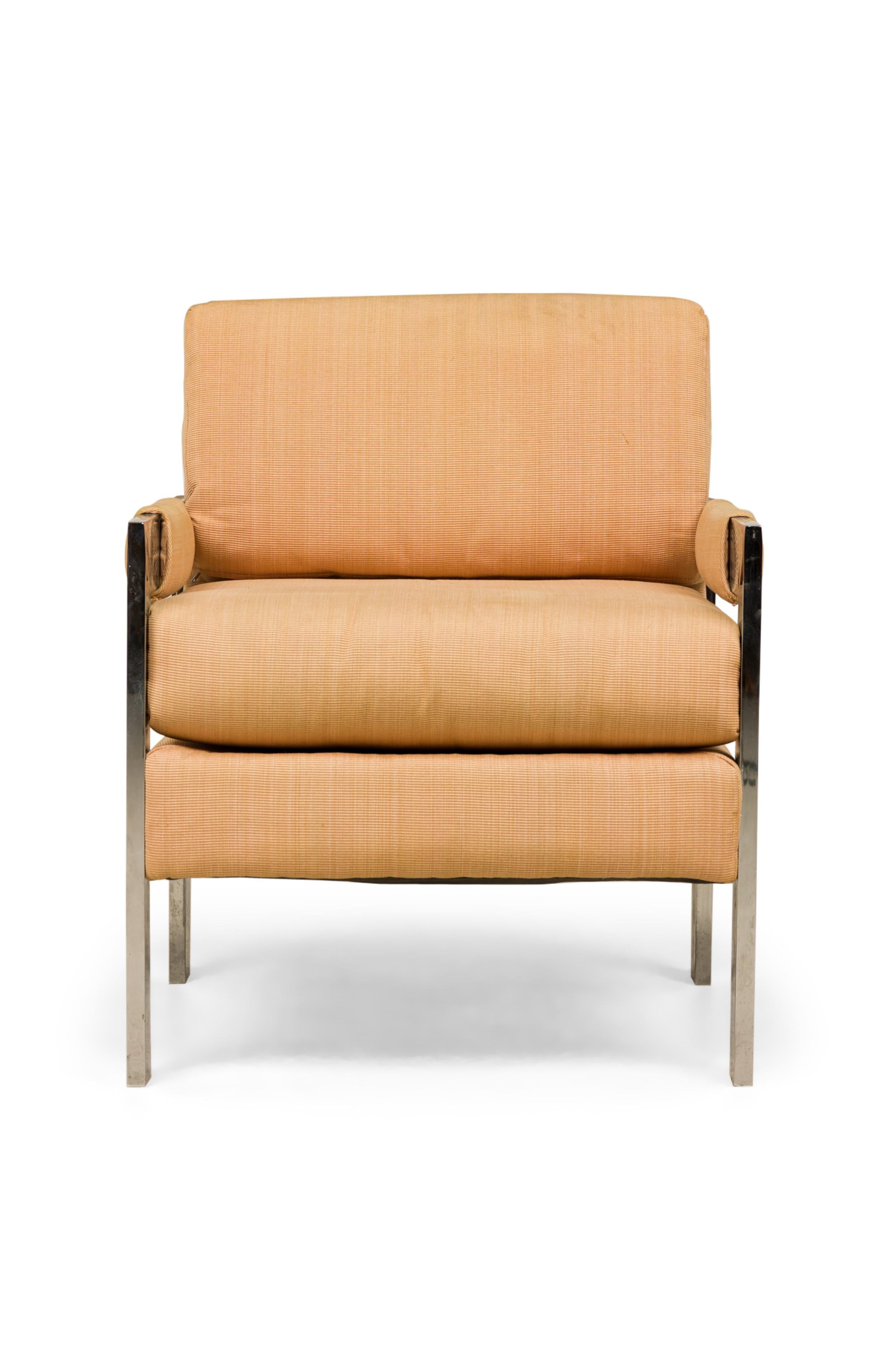 PAIR of American Mid-Century armchairs with polished chrome flat bar frames, upholstered in a textured tan fabric with removable seat cushions. (MILO BAUGHMAN FOR DIRECTIONAL)(PRICED AS PAIR)
 

 Some wear on upholstery.

