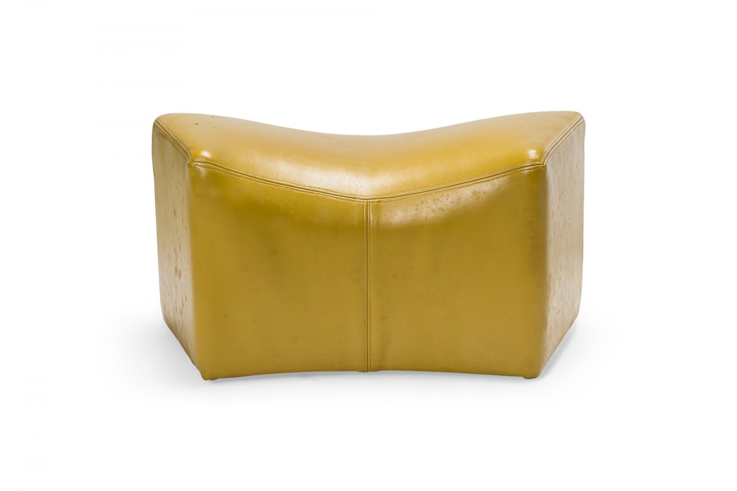 PAIR of American Mid-Century saddle ottomans with bright yellow leather upholstery. (PRICED AS PAIR)(Available in black upholstery: DUF0345)
