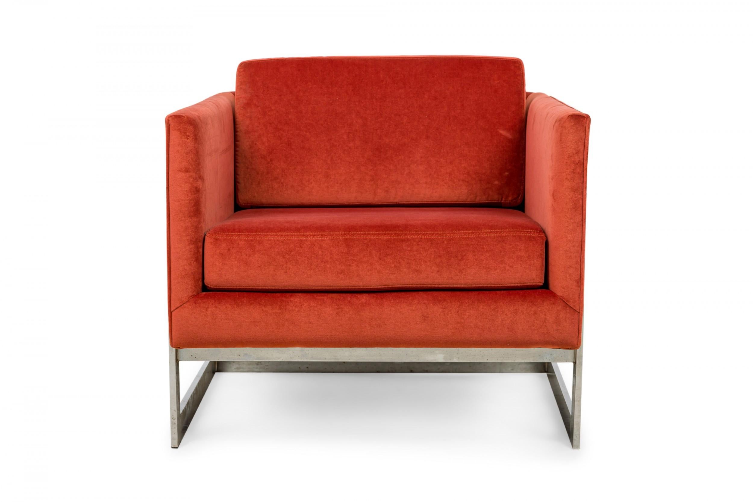 Pair of American mid-century floating cube lounge /armchairs with polished chrome frames and orange velvet upholstery. (MILO BAUGHMAN FOR THAYER COGGIN)(PRICED AS PAIR)