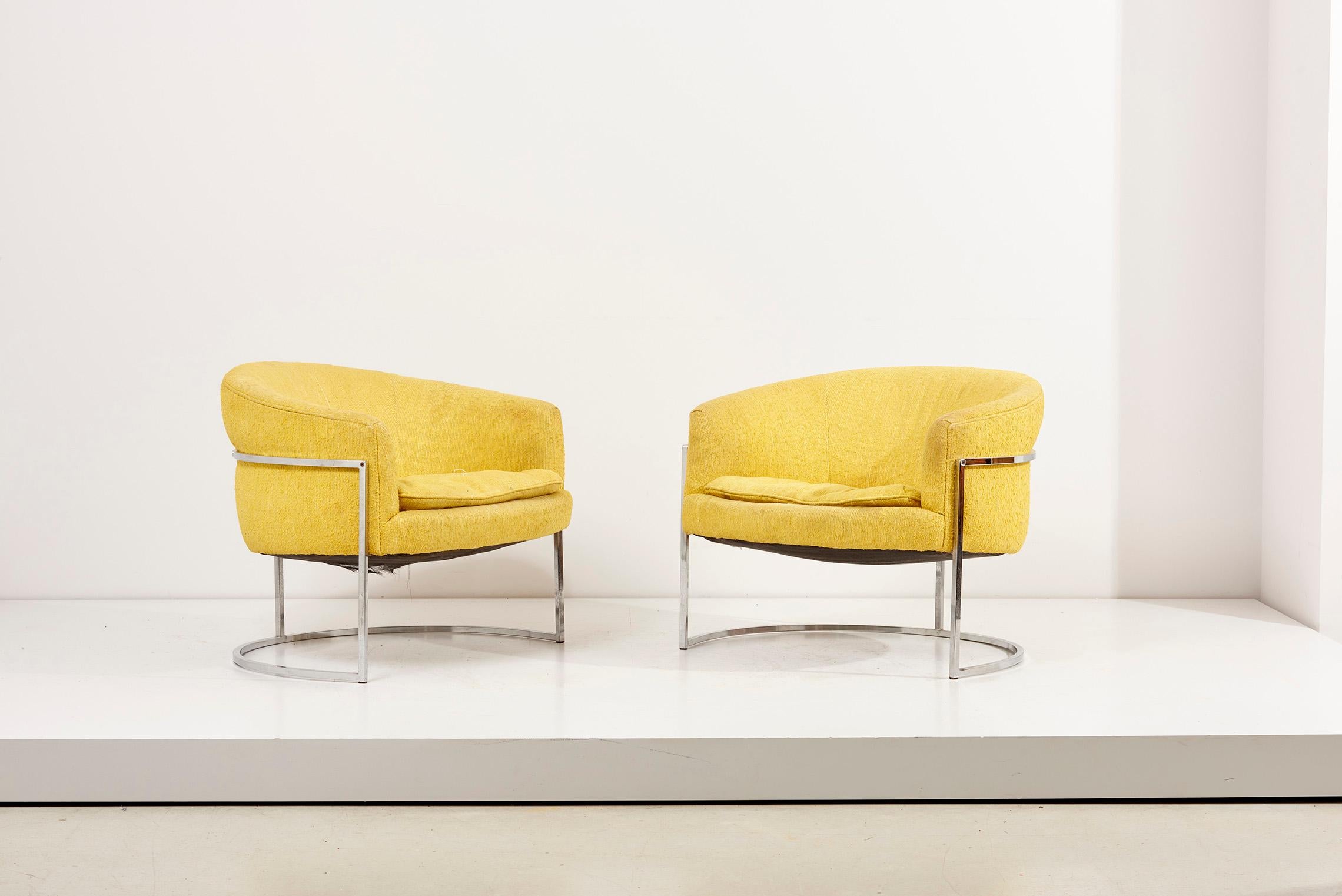Pair of Bernhardt lounge chairs in chrome and yellow upholstery. 
The chairs have vintage upholstery. We are offering also reupholstery in our in house workshop.