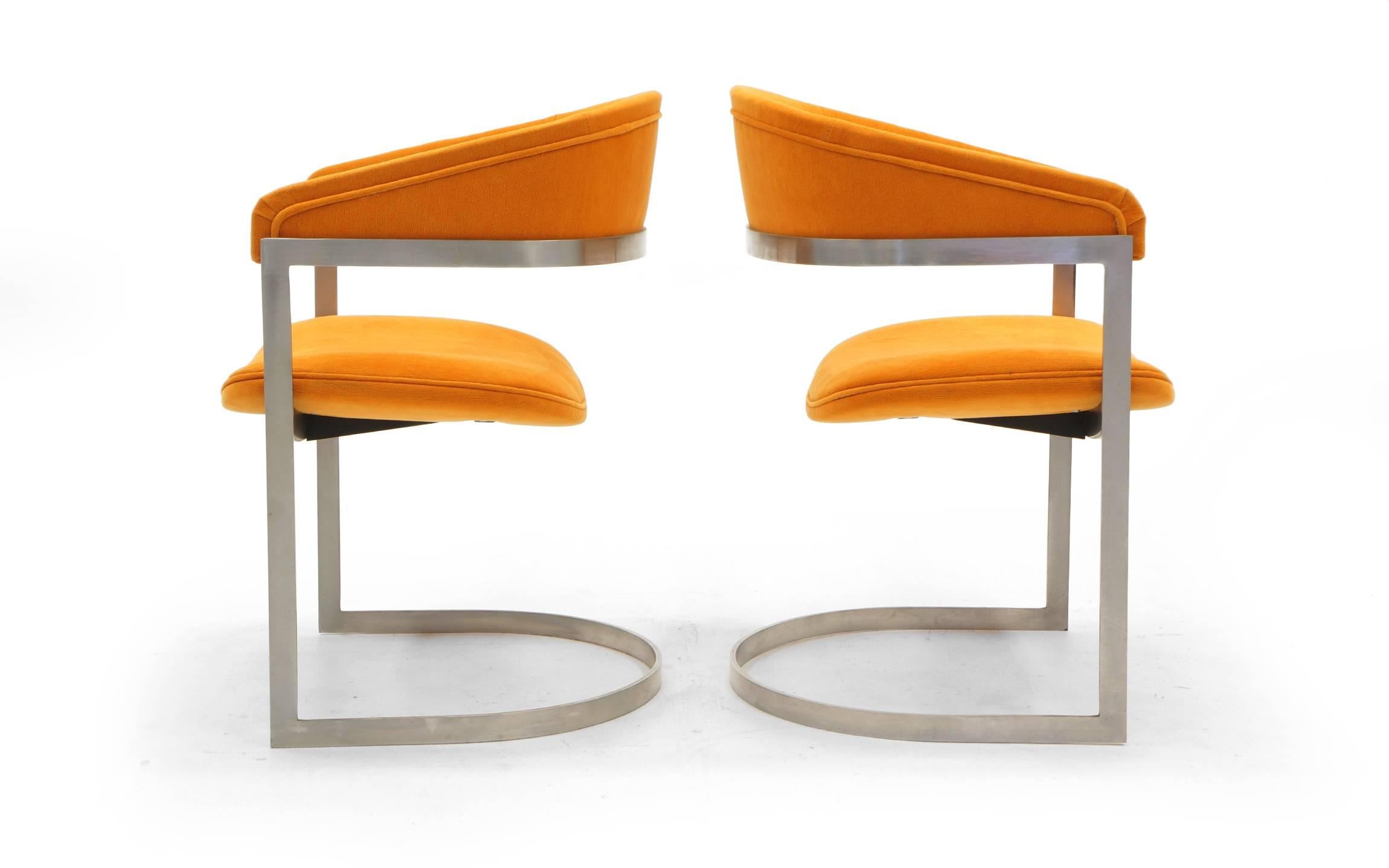 Pair of Milo Baughman for Thayer Coggin style side chairs. Brushed steel frames and orange Maharam fabric. Expertly restored.