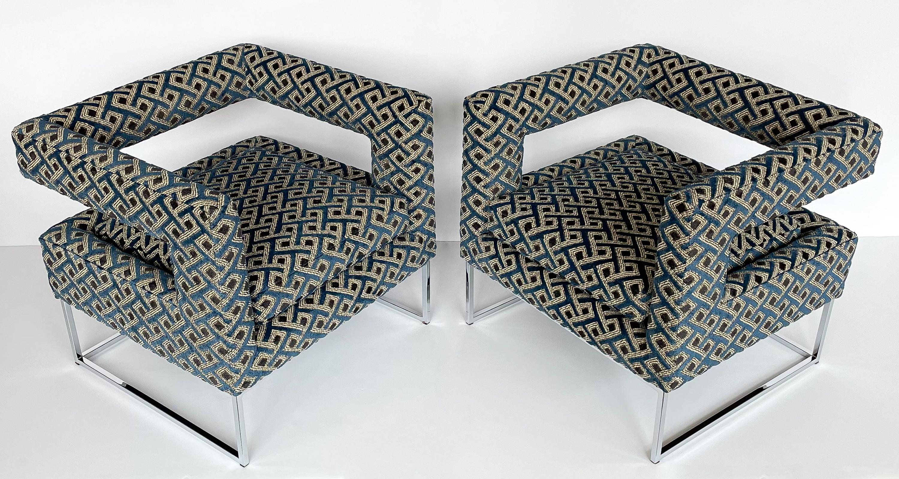 Striking pair of Milo Baughman open back lounge chairs, circa 1970s. These cube shaped chairs are newly upholstered in Pierre Frey cut linen velvet with a geometric design in indigo blue. All new foam throughout. Loose seat cushion. Chrome-plated