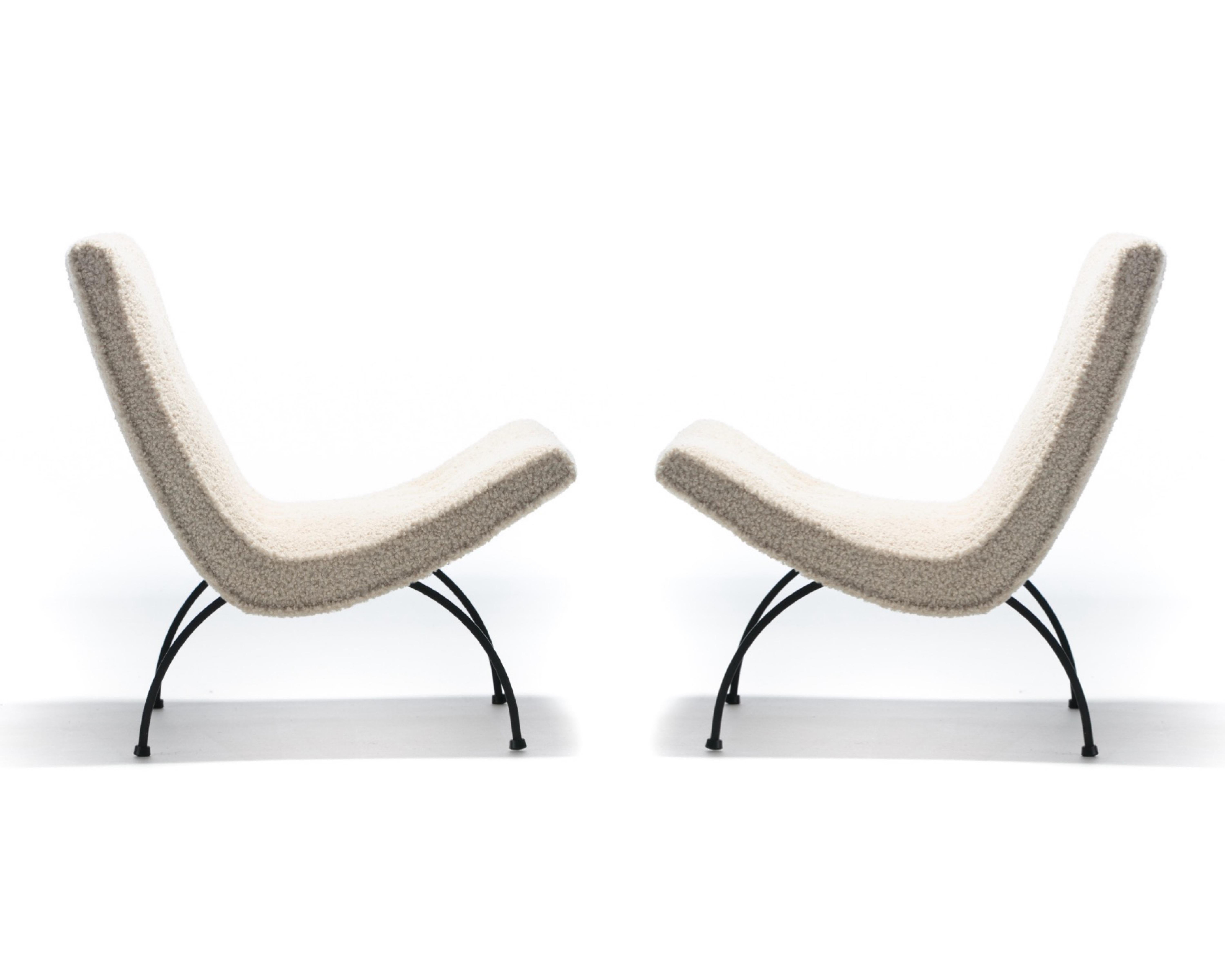 This pair of Milo Baughman 1950s scoop chairs hit all the marks with gorgeous Mid Century Modern sculptural profiles, a very comfortable ergonomic design with wide seats, and new soft ivory bouclé upholstery with a high durability rating of over