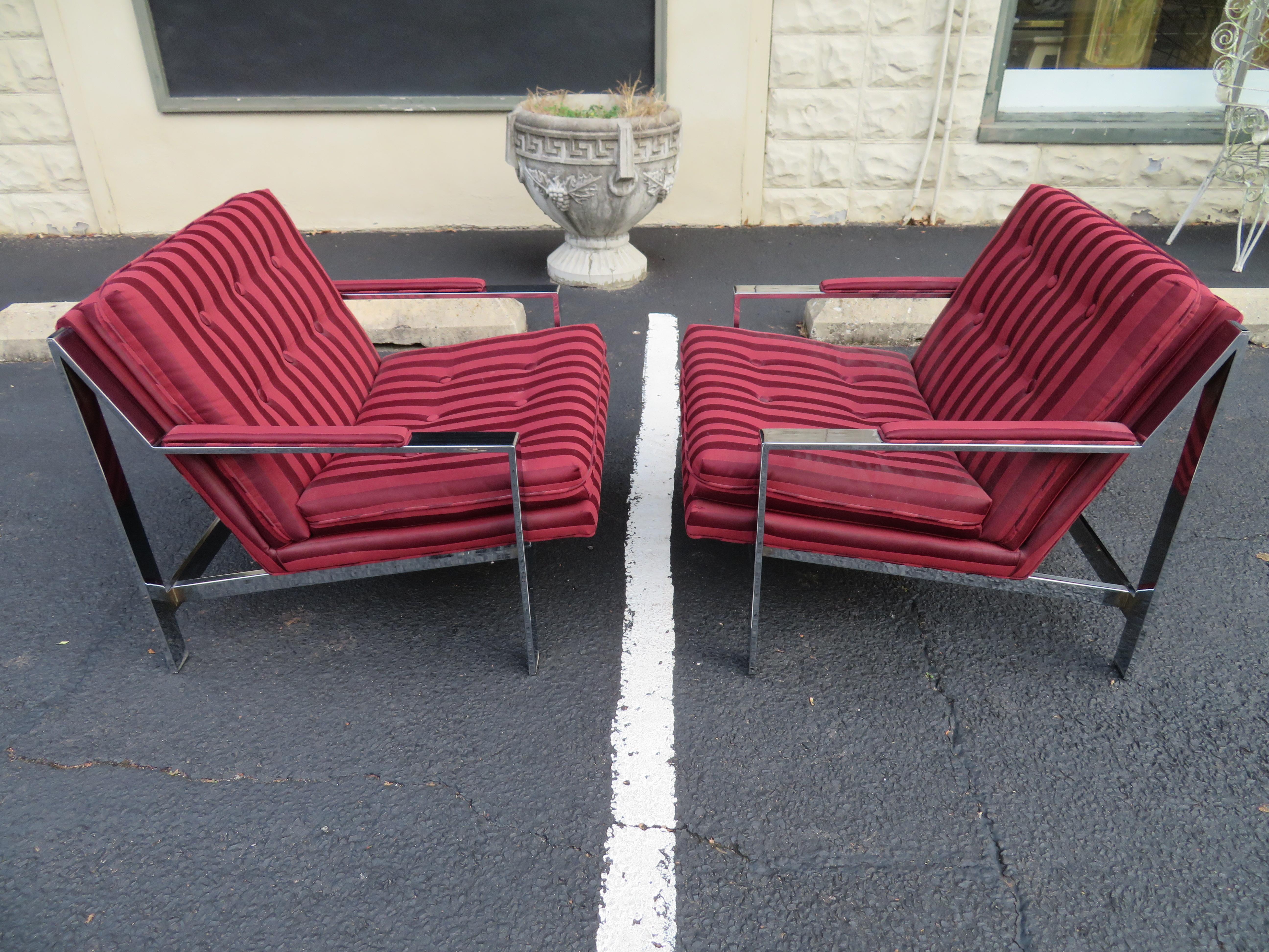 Fantastic pair of Milo Baughman style chrome flat bar lounge chairs. These actually look nice as is but would be best reupholstered. The chrome frames are in very nice vintage condition-very shiny-some minor dings.