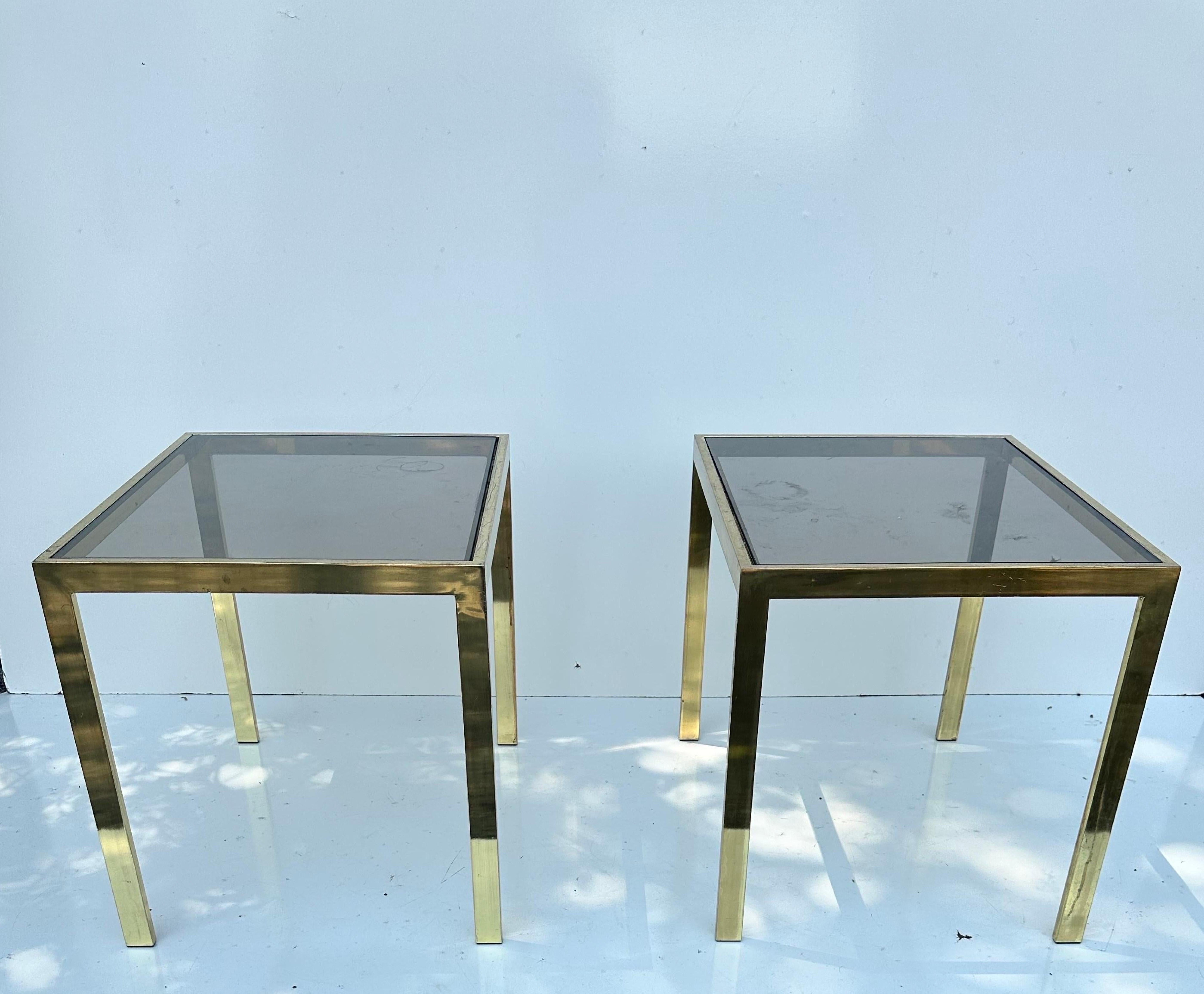 Pair of Milo Baughman Style Side Brass and Smoke glass side table .