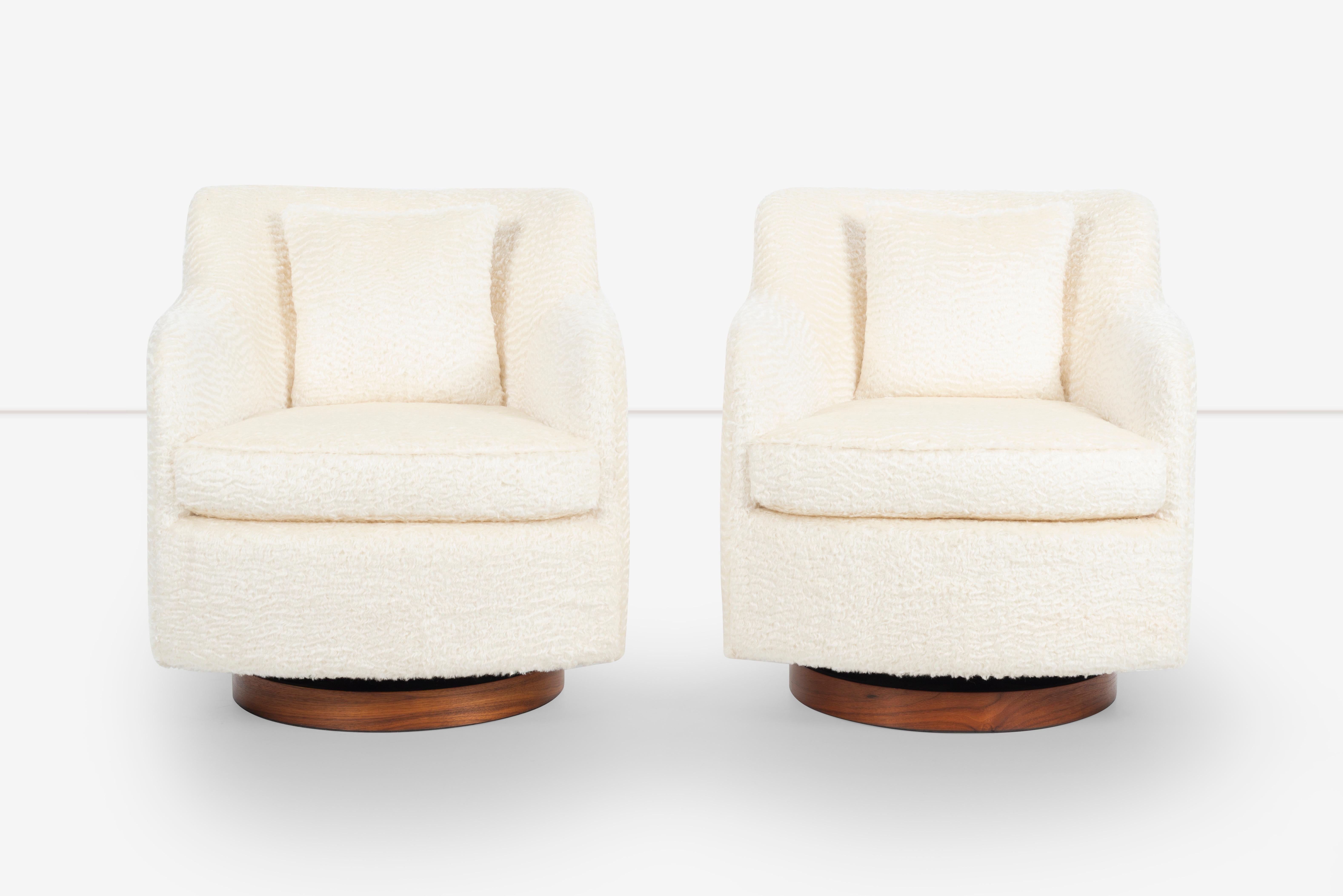 Milo Baughman created some of the most luxurious and sought-after pieces of Mid-Century Modern furniture. These chairs feature a plush, soft mohair upholstery that adds a touch of glamour and sophistication to any room. The walnut base provides a