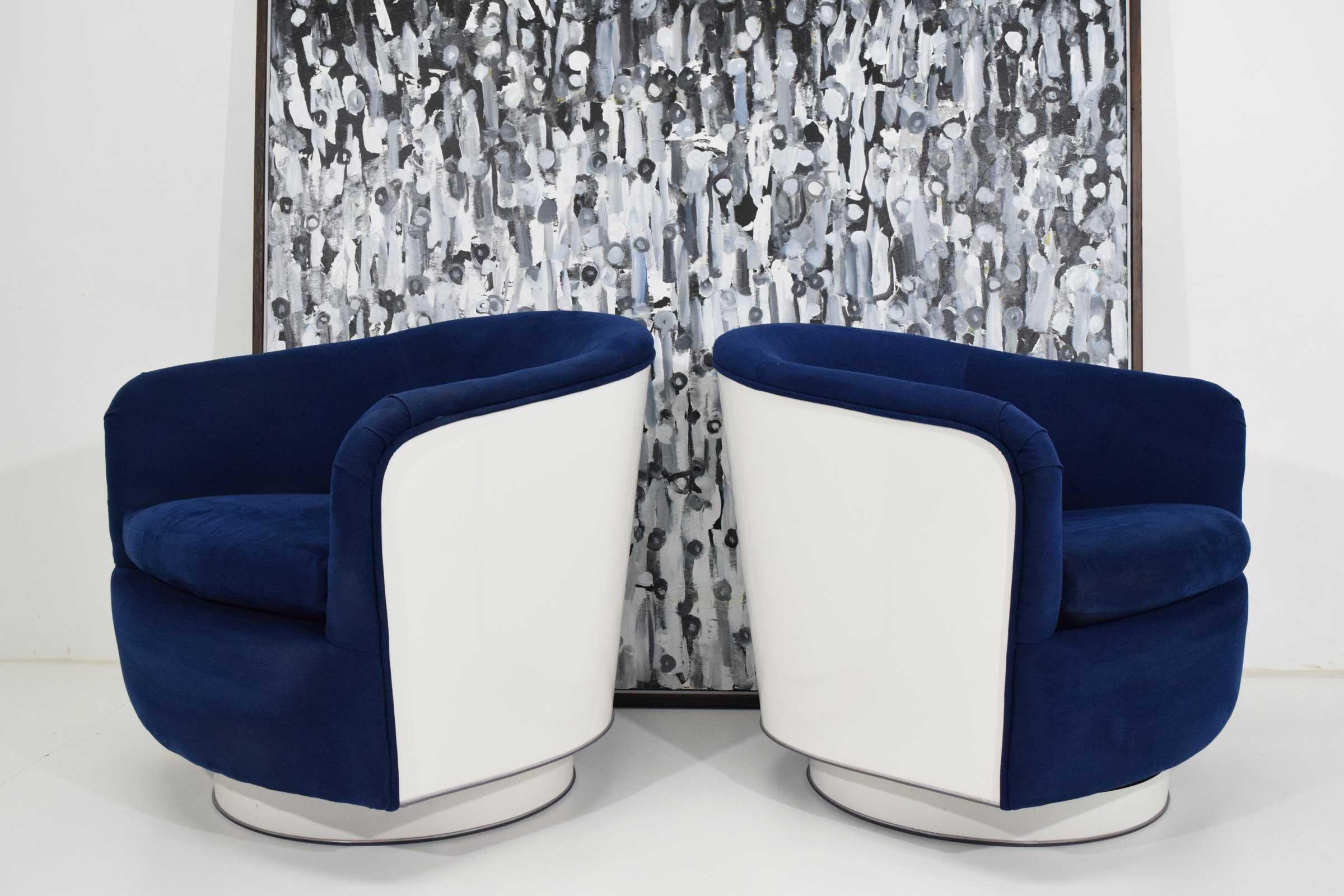 blue and white swivel chairs